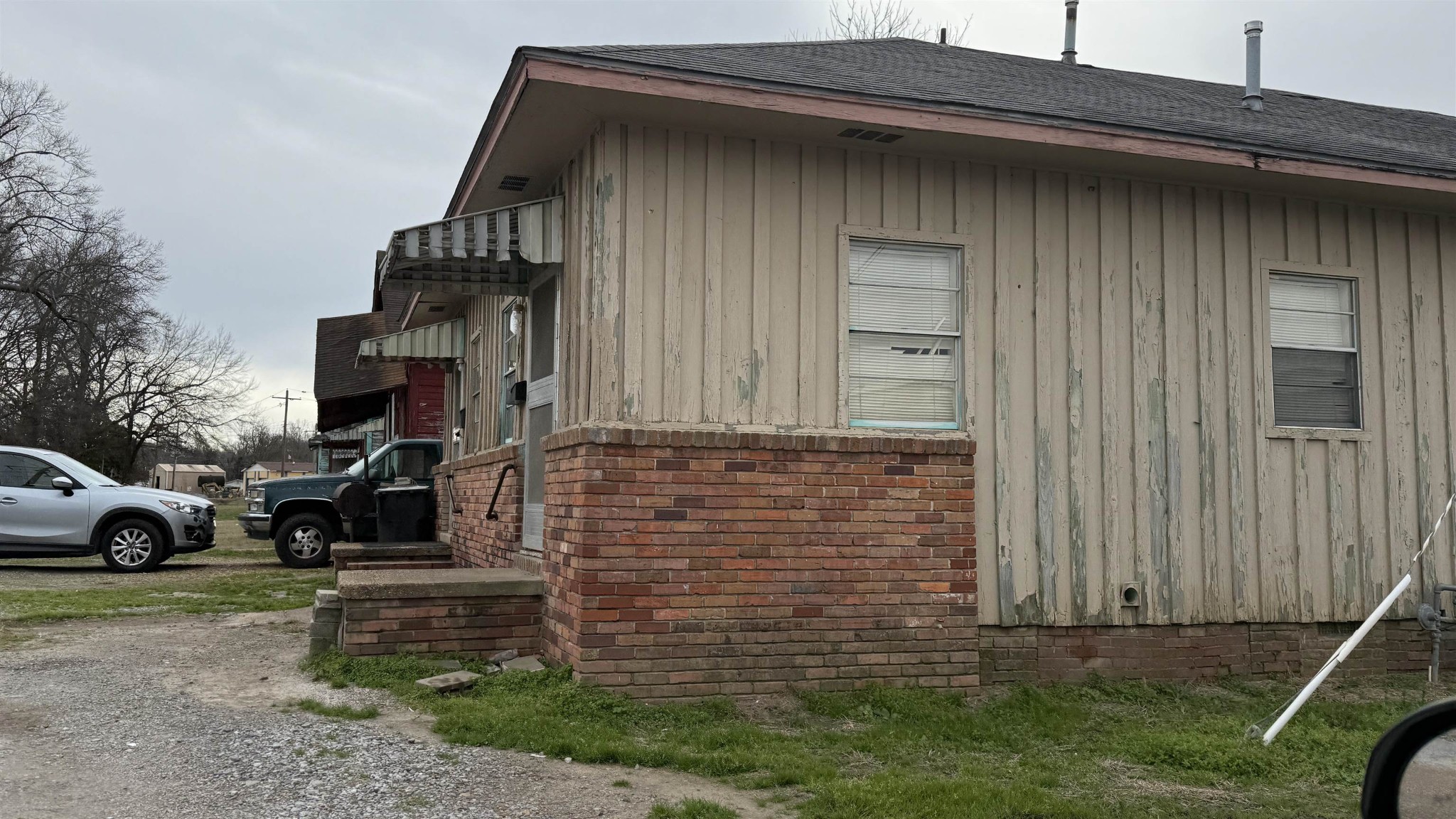 0 South 3rd Street West Helena, AR 72390 - Photo 16 of 32 a front view of a house with parking area