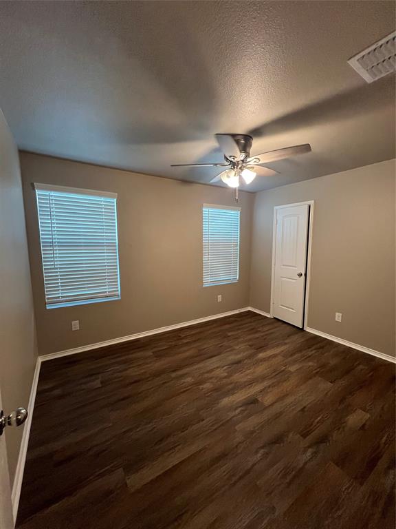 1515 Fields View Drive Anna, TX 75409 - Photo 10 of 16 a view of an empty room with window and wooden floor
