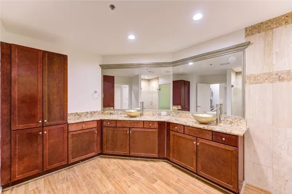 a view of a hallway with washer and dryer