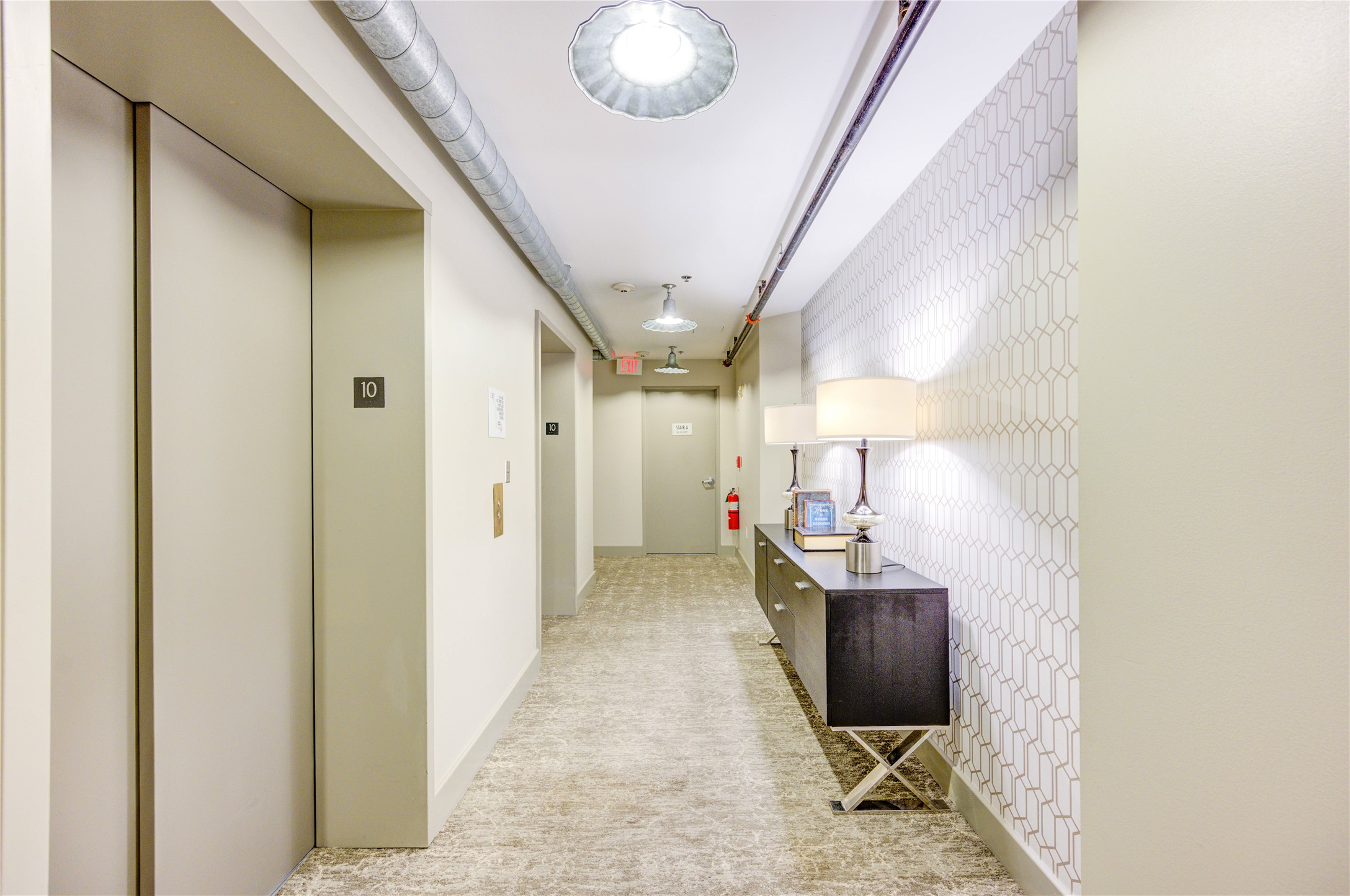 917 Main Street, Unit 1005 Houston, TX 77002 - Photo 7 of 32 Hallway if the 10th Floor where Unit is Located