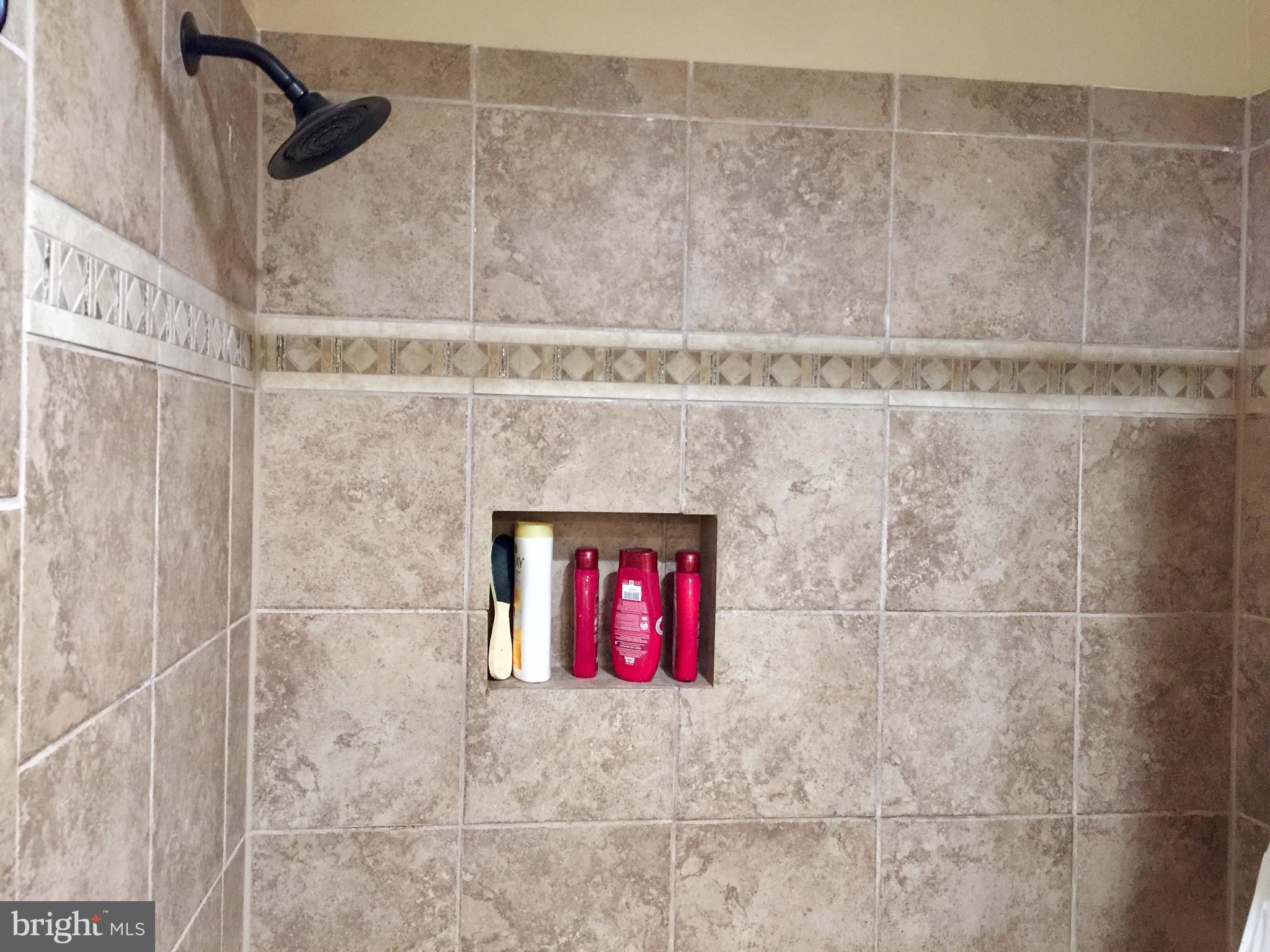 7756 Burnside Road Landover, MD 20785 - Photo 16 of 18 Second Level Ceramic Bathroom
