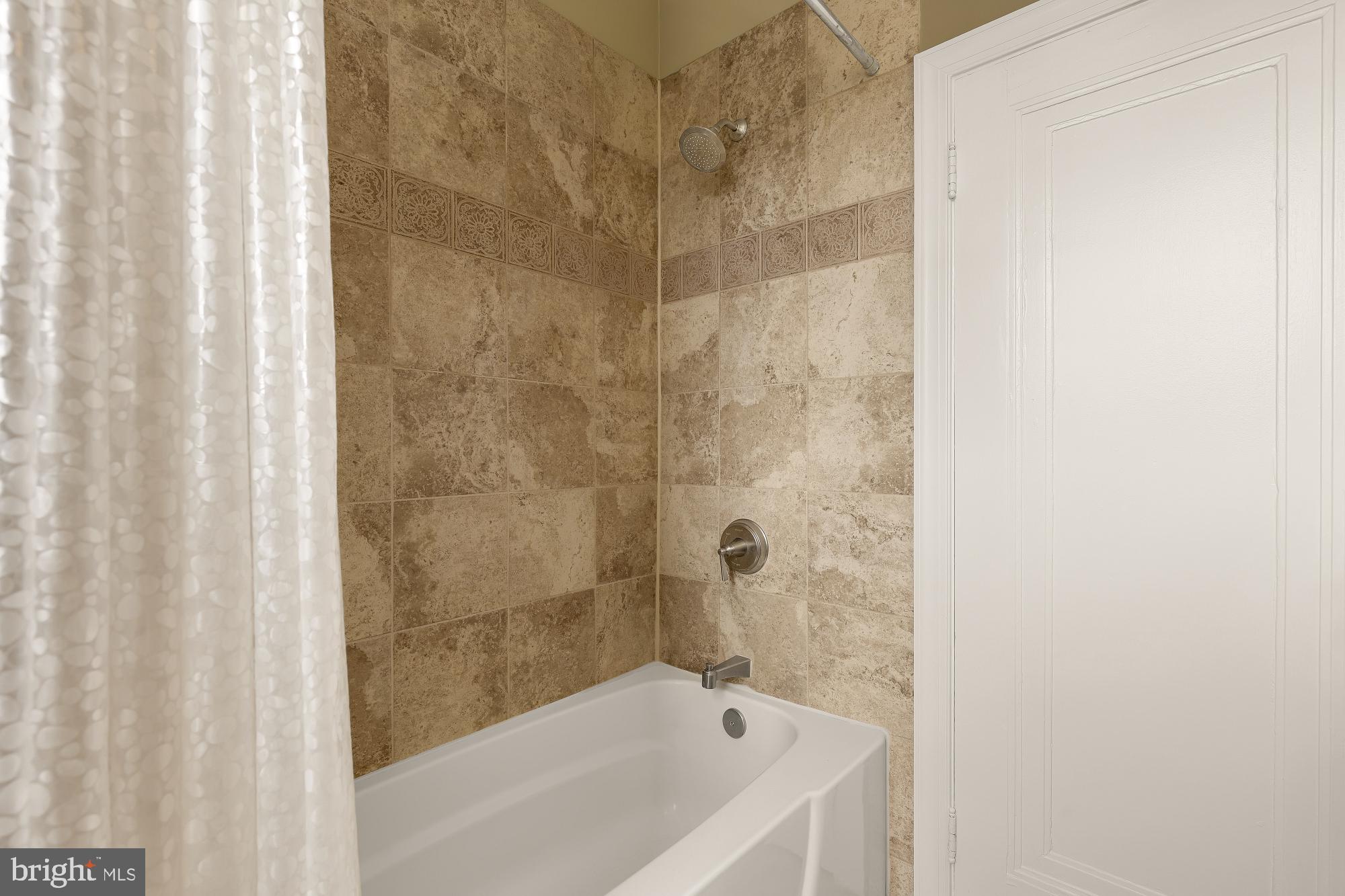 1409 Decatur Street Northwest Washington, DC 20011 - Photo 27 of 42 a bathroom with a bathtub