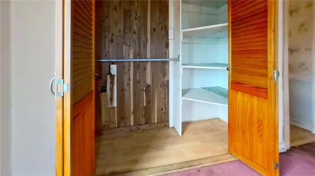 a view of entryway with wooden floor