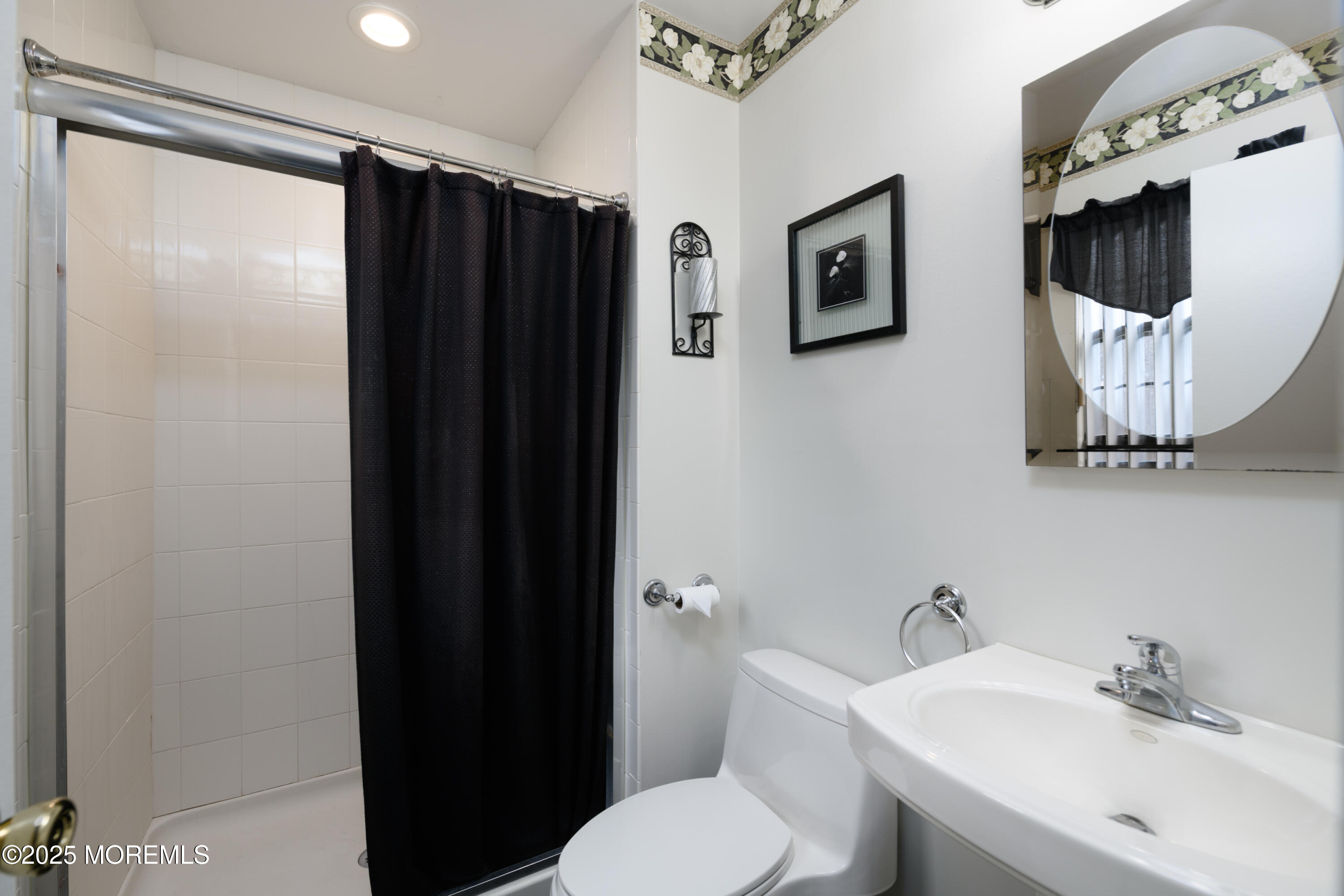 85 Starlight Road Howell, NJ 07731 - Photo 11 of 37 a bathroom with a sink toilet and mirror