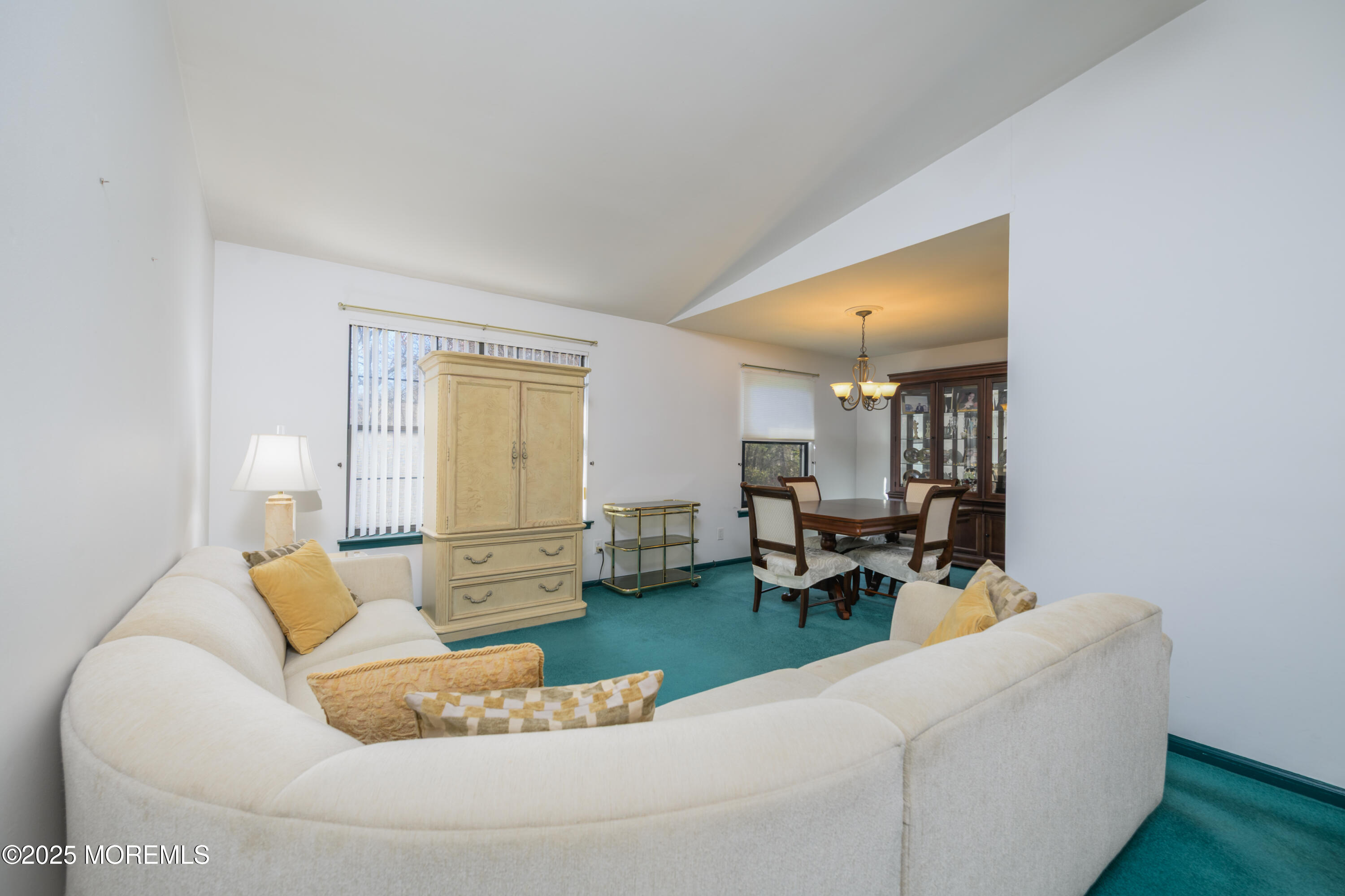 85 Starlight Road Howell, NJ 07731 - Photo 2 of 37 a living room with furniture and a table
