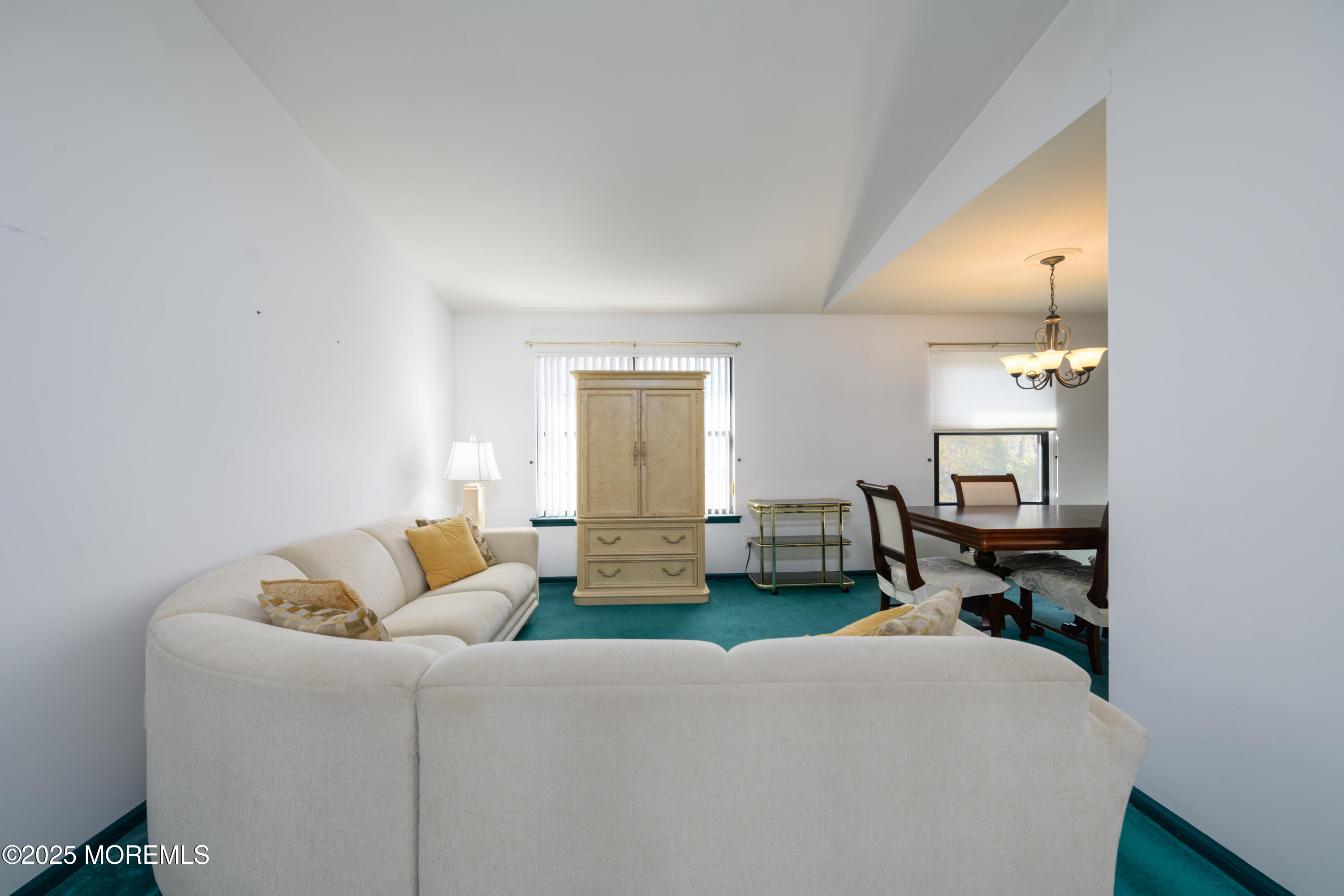 85 Starlight Road Howell, NJ 07731 - Photo 22 of 37 a living room with furniture and a window