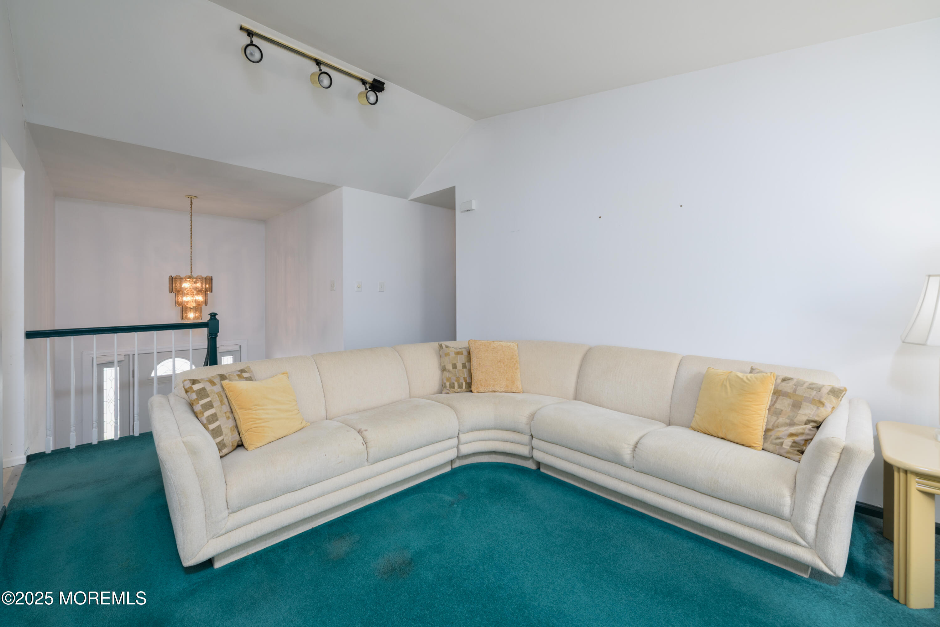 85 Starlight Road Howell, NJ 07731 - Photo 23 of 37 a living room with furniture and a couch