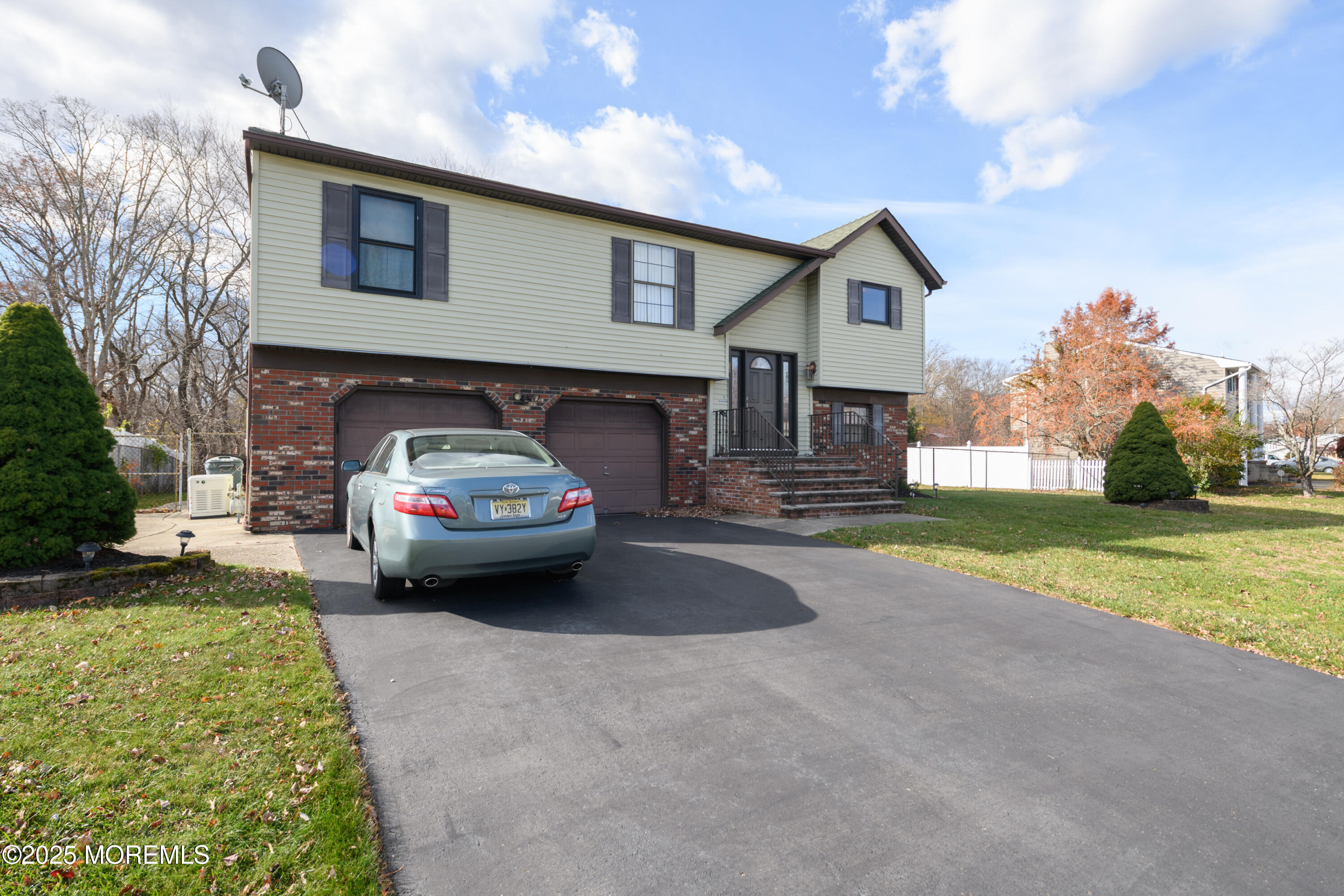 85 Starlight Road Howell, NJ 07731 - Photo 28 of 37 a car parked in front of a house
