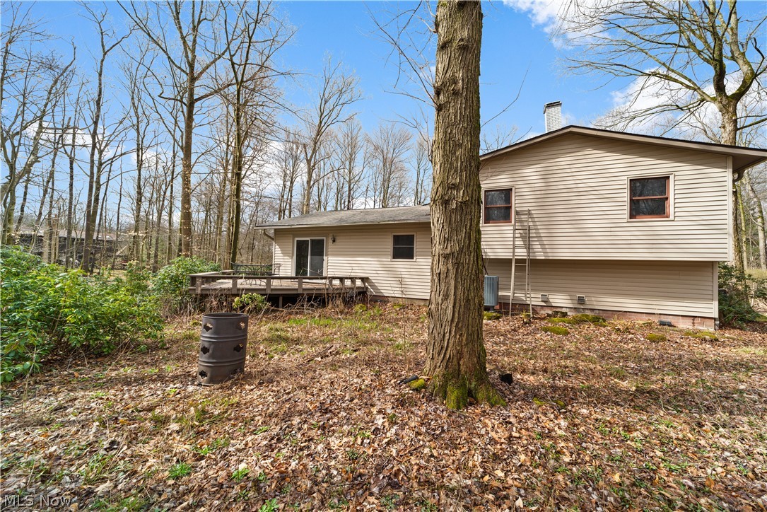 18763 Sharon Road Chagrin Falls, OH 44023 - Photo 3 of 37 Rear view of property with a wooden deck and central AC