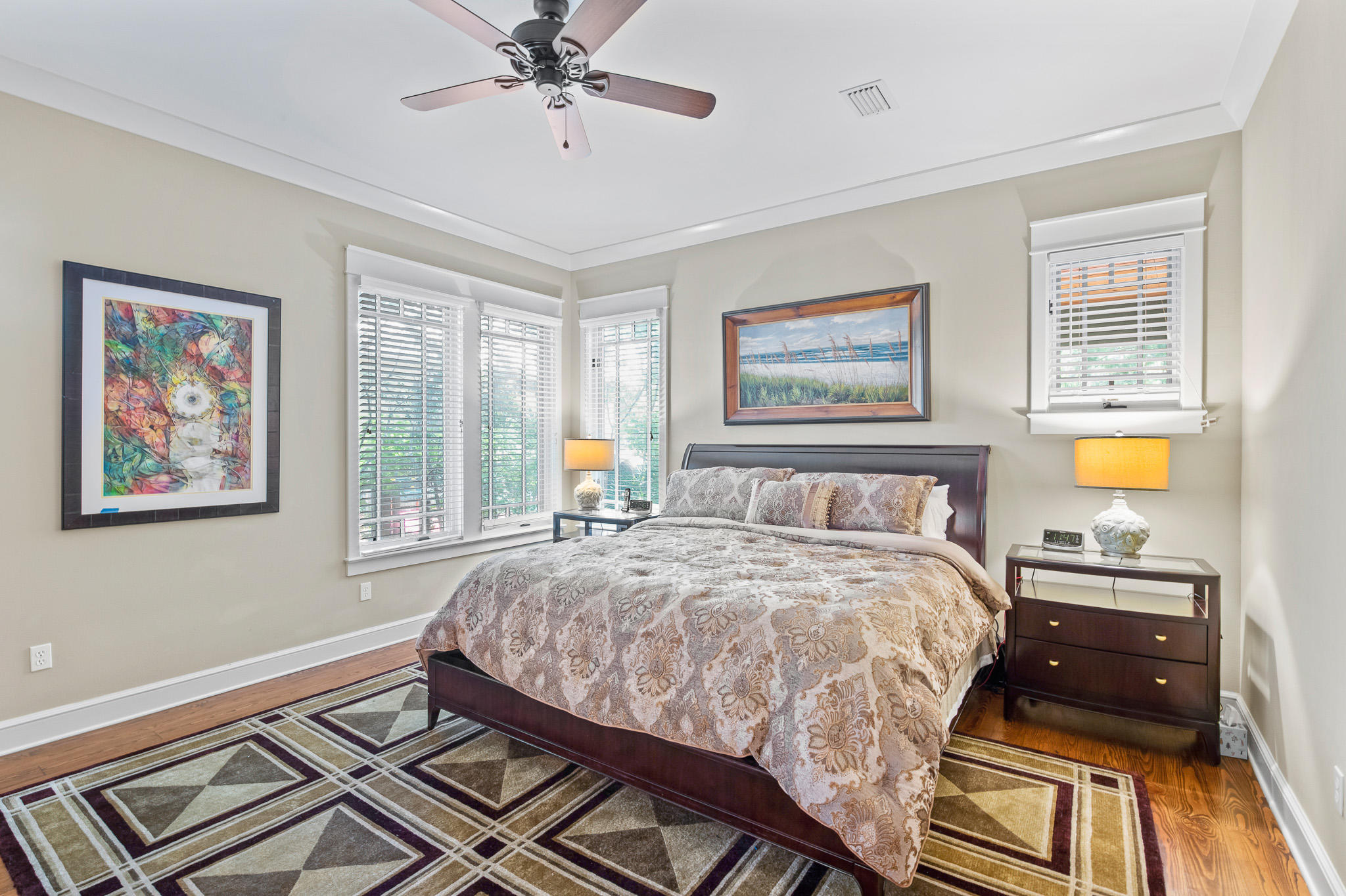 106 Okeechobee West Santa Rosa Beach, FL 32459 - Photo 17 of 53 a bedroom with a bed and wooden floor