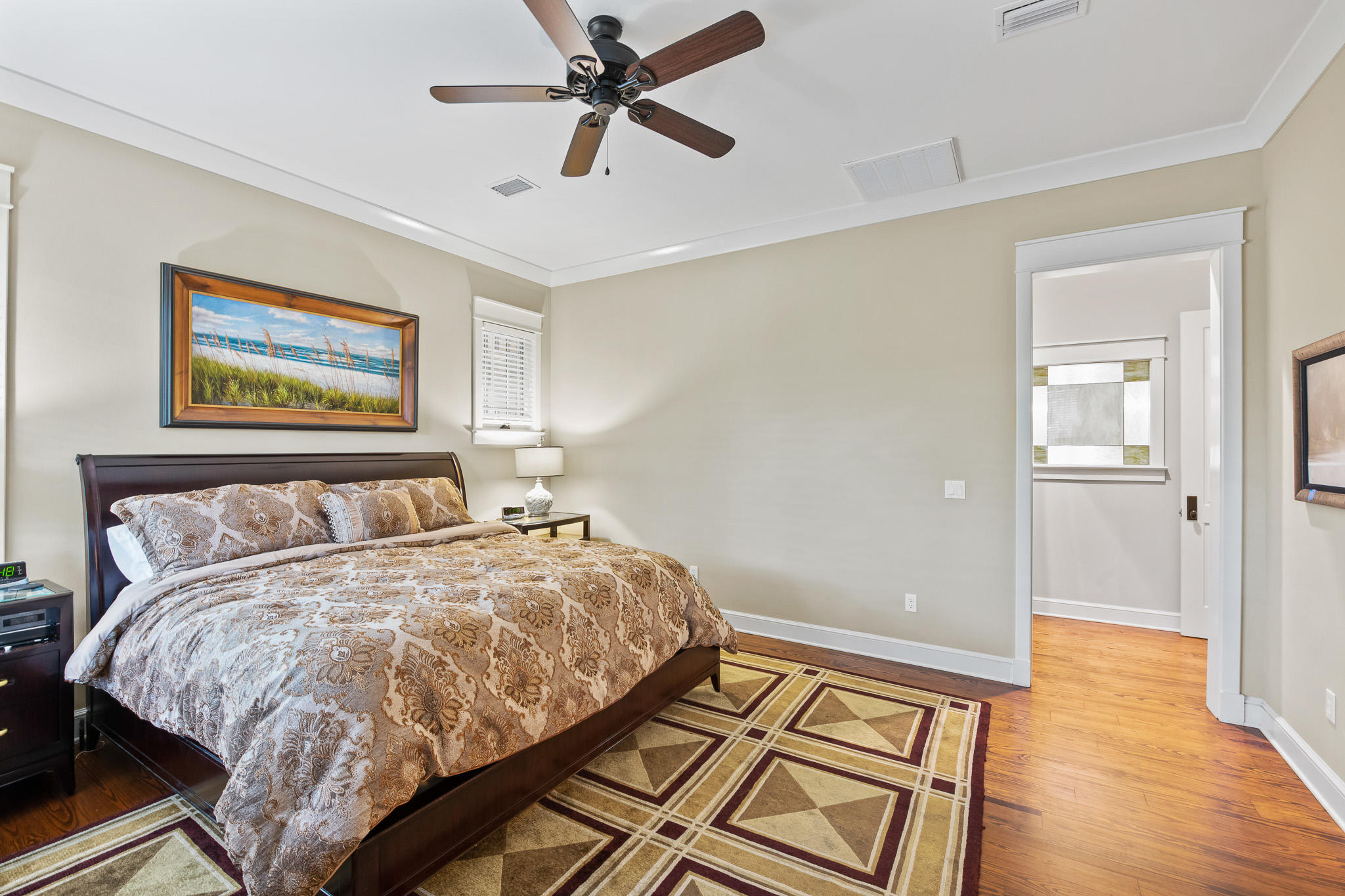 106 Okeechobee West Santa Rosa Beach, FL 32459 - Photo 19 of 53 a bed sitting in a room next to a window