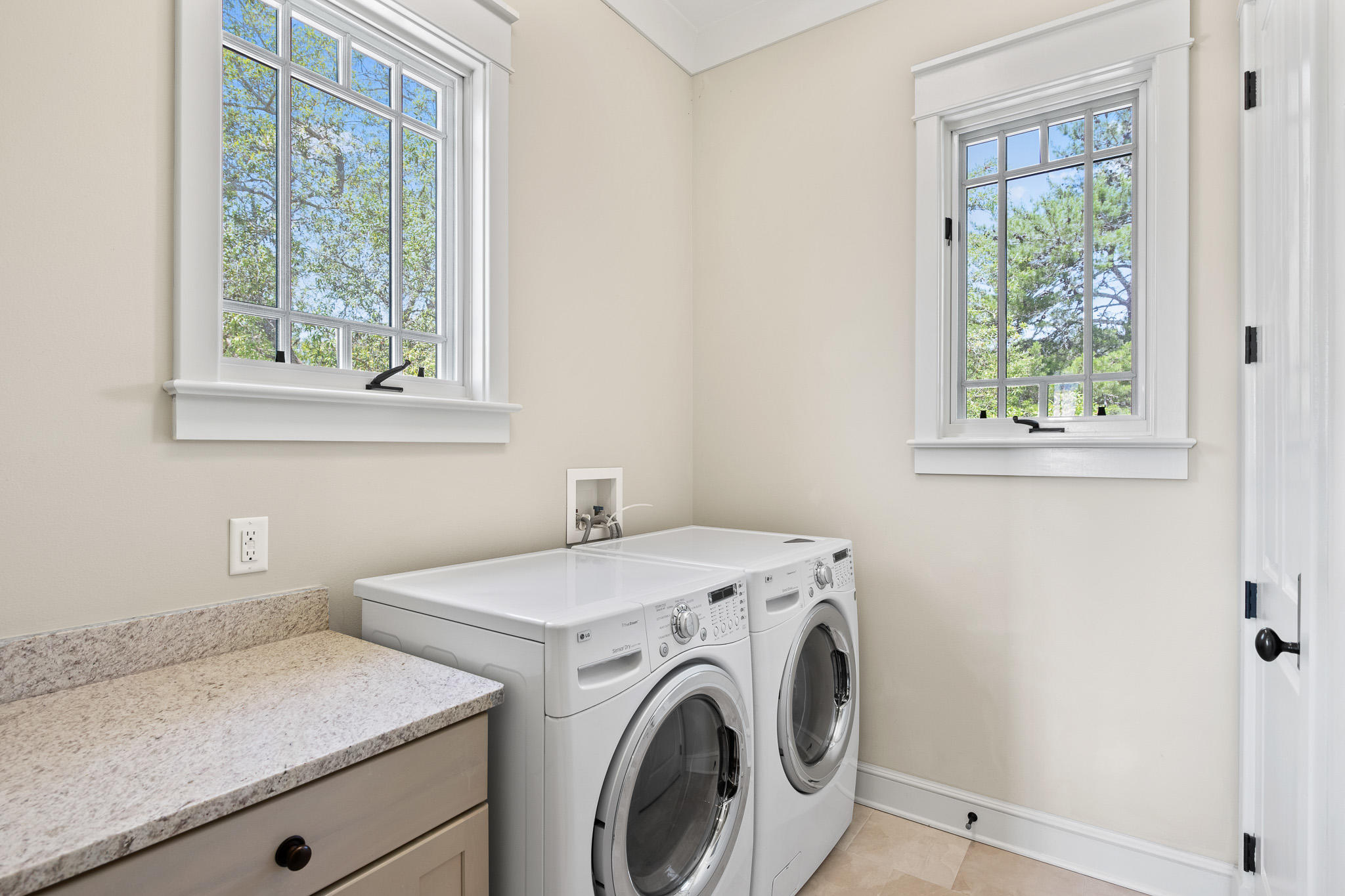 106 Okeechobee West Santa Rosa Beach, FL 32459 - Photo 27 of 53 a utility room with dryer and washer