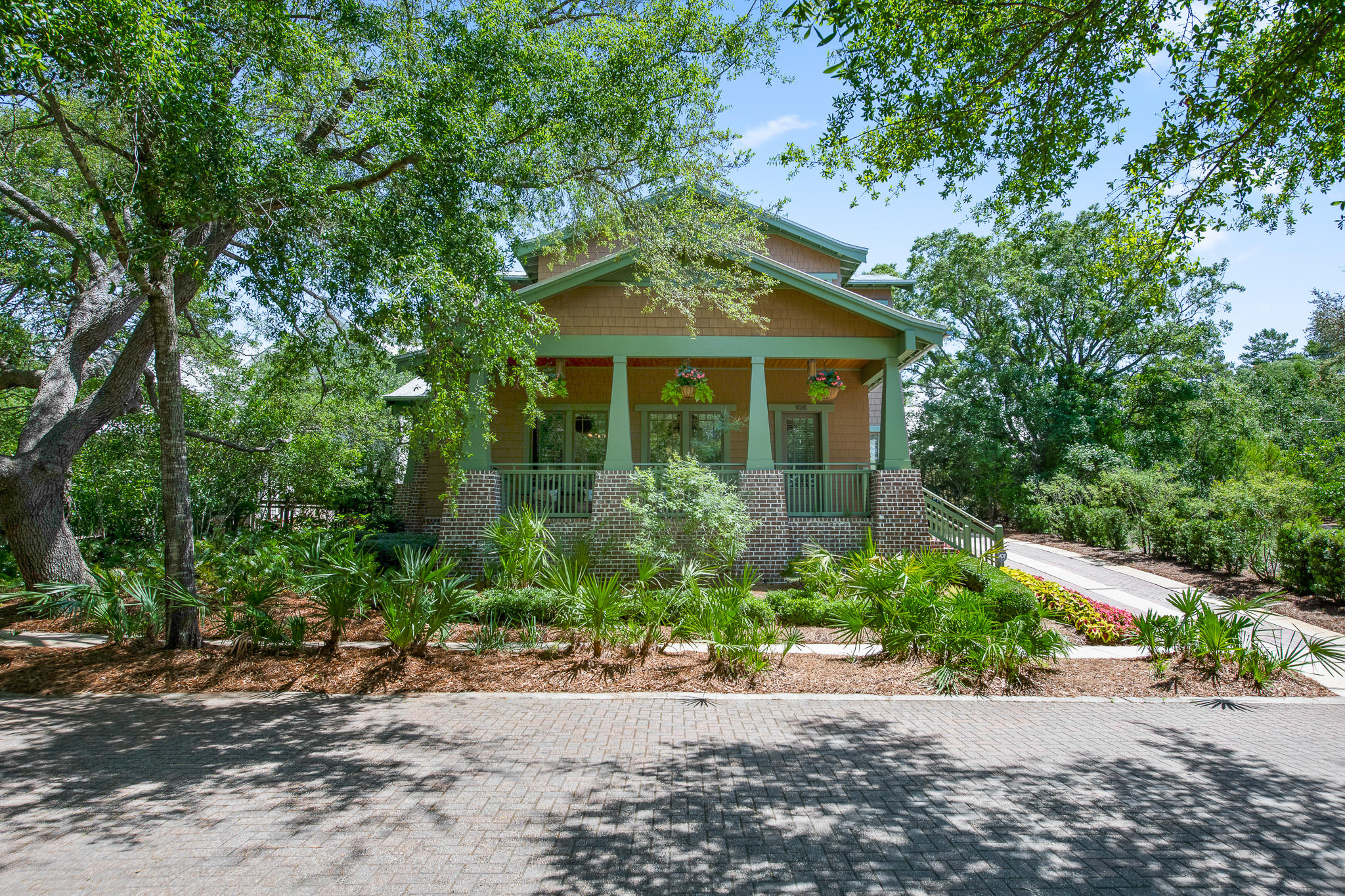 106 Okeechobee West Santa Rosa Beach, FL 32459 - Photo 53 of 53 a front view of a house with a yard and a garage
