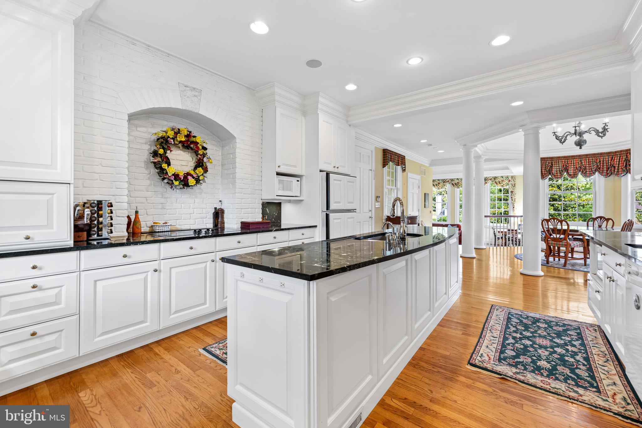 508 Hampton Lane Baltimore, MD 21286 - Photo 16 of 74 a large kitchen with stainless steel appliances granite countertop a sink and cabinets