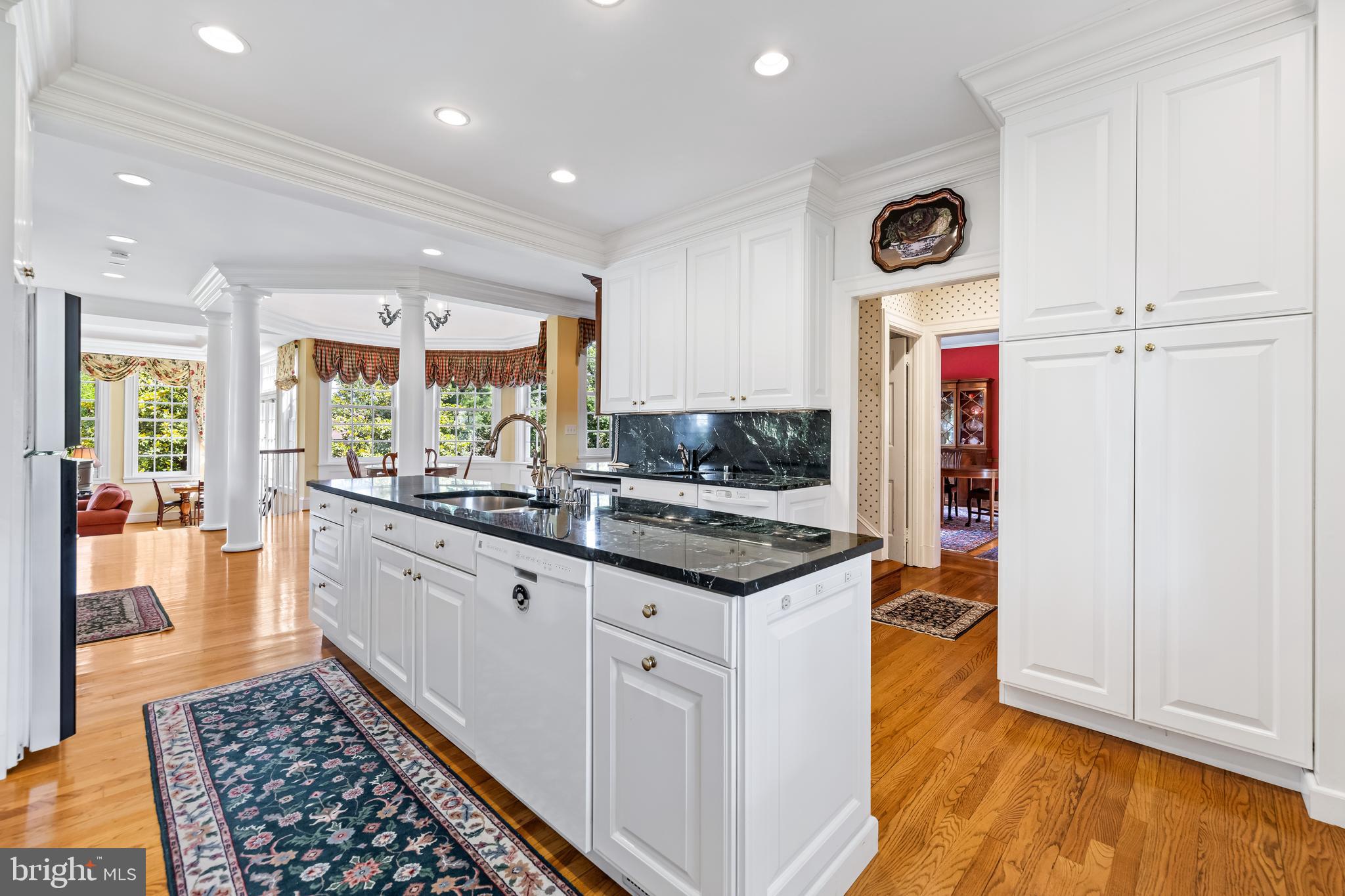 508 Hampton Lane Baltimore, MD 21286 - Photo 18 of 74 a kitchen with stainless steel appliances granite countertop a stove and a sink