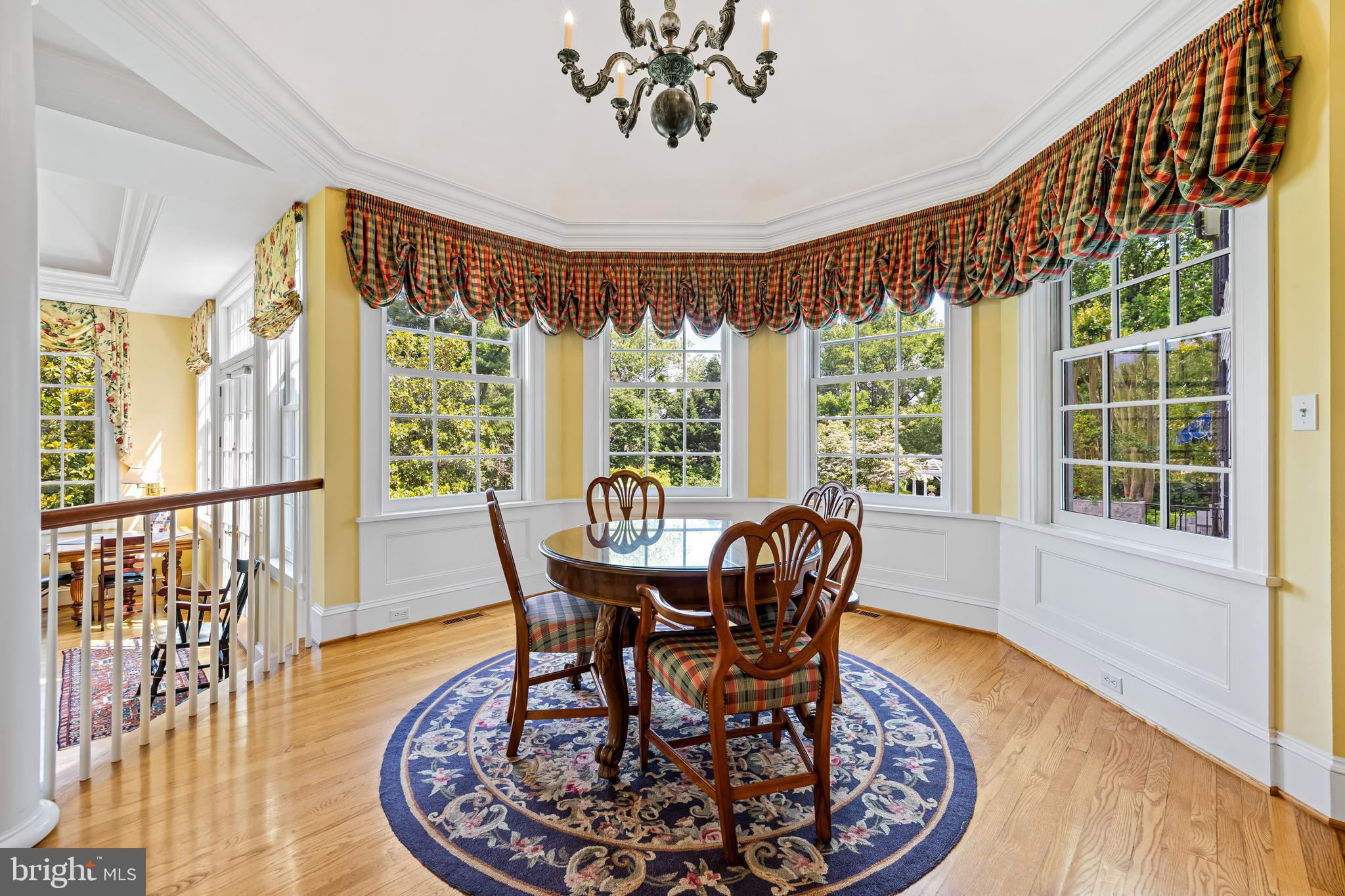 508 Hampton Lane Baltimore, MD 21286 - Photo 23 of 74 a view of a dining room with furniture window and wooden floor