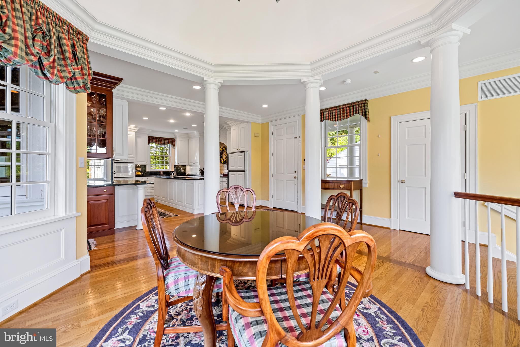 508 Hampton Lane Baltimore, MD 21286 - Photo 24 of 74 a dining room with furniture a rug and wooden floor