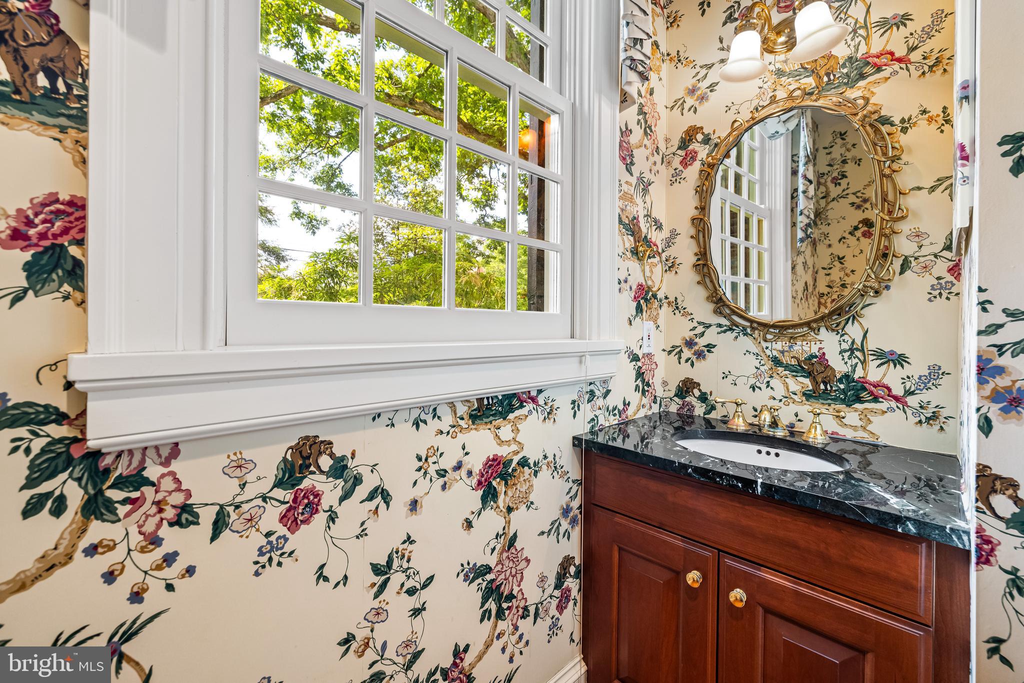 508 Hampton Lane Baltimore, MD 21286 - Photo 30 of 74 a bathroom with a sink and a mirror