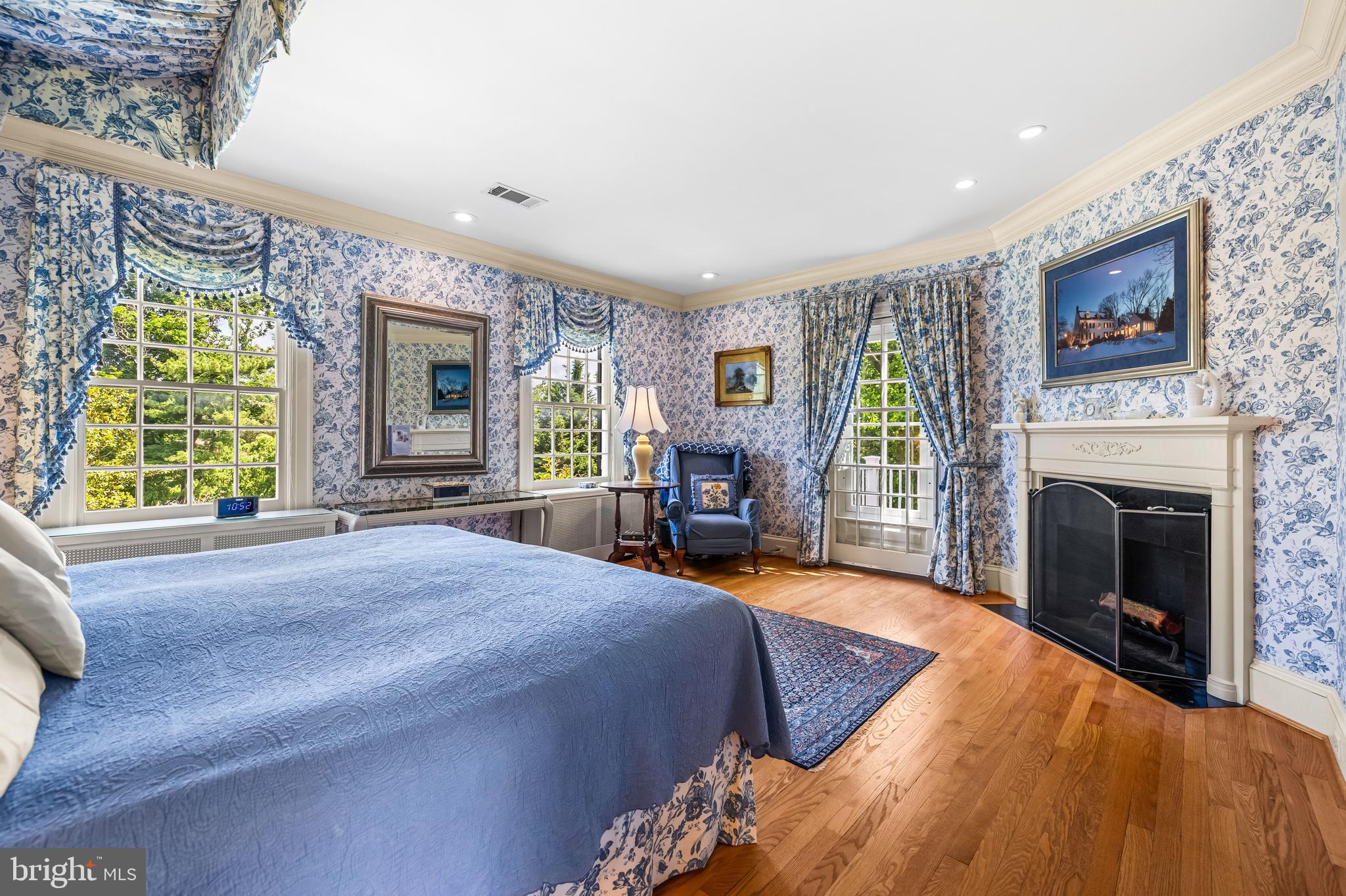 508 Hampton Lane Baltimore, MD 21286 - Photo 35 of 74 a bed room with a bed and a fireplace