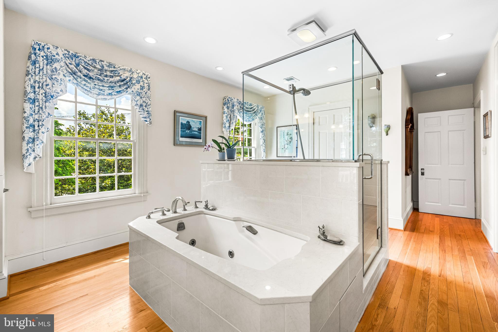 508 Hampton Lane Baltimore, MD 21286 - Photo 40 of 74 a bathroom with a bathtub and a shower