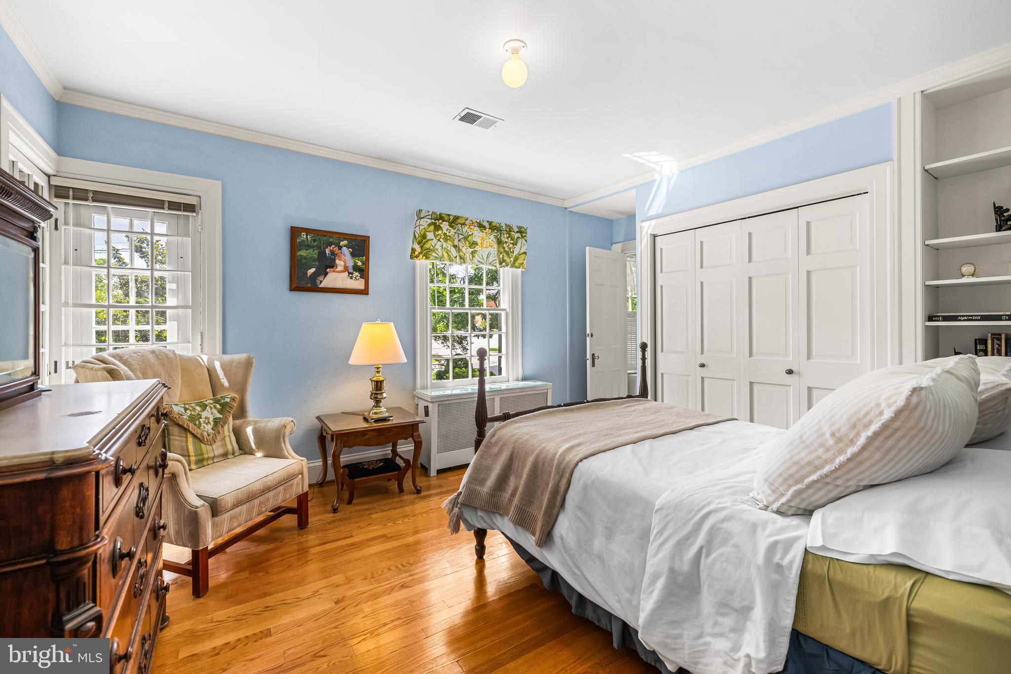 508 Hampton Lane Baltimore, MD 21286 - Photo 43 of 74 a bedroom with a bed and wooden floor