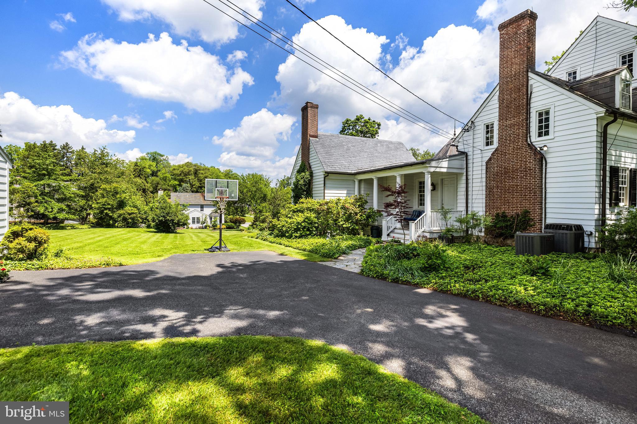 508 Hampton Lane Baltimore, MD 21286 - Photo 61 of 74 a view of a house with a big yard plants and large trees
