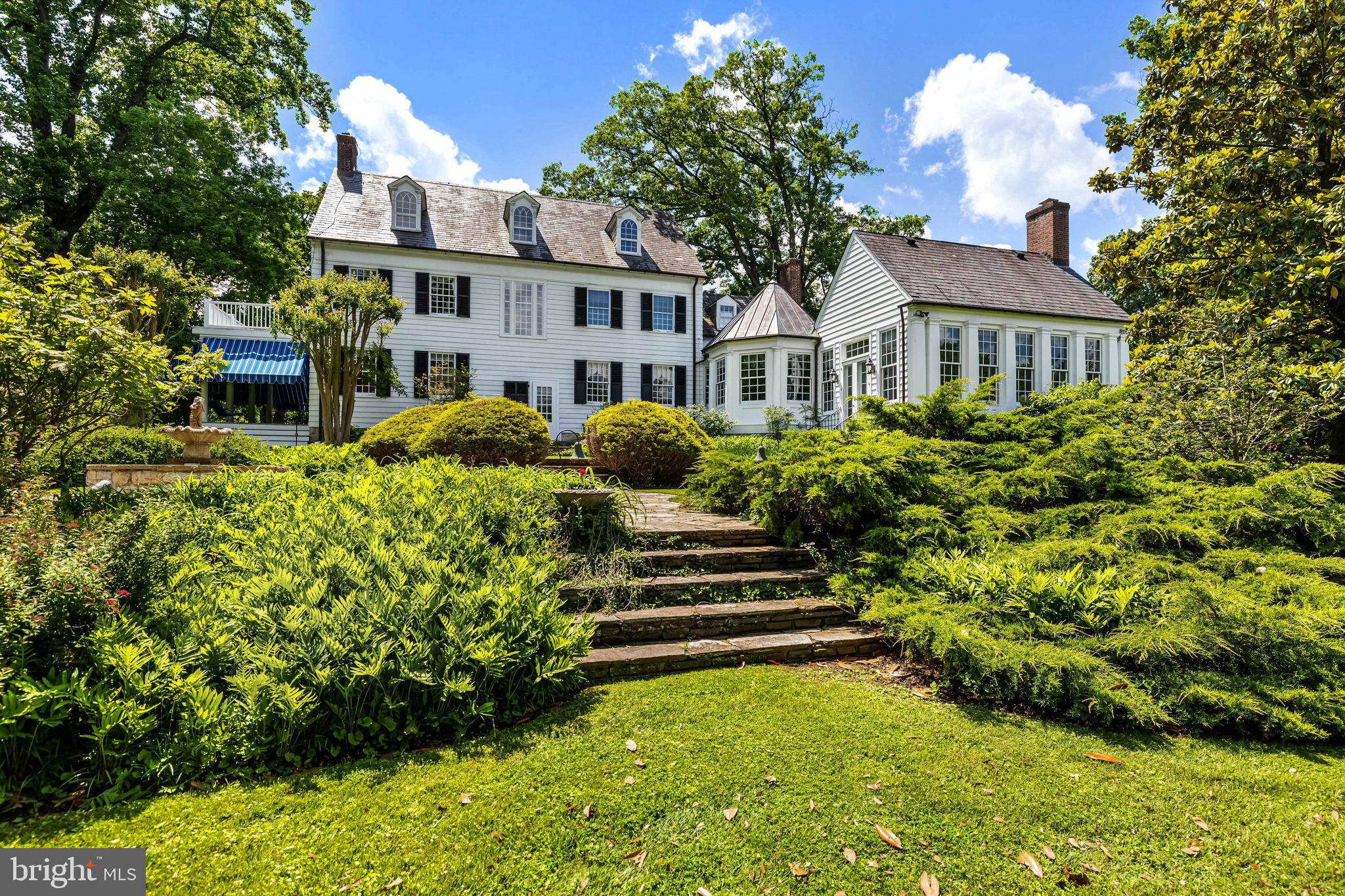 508 Hampton Lane Baltimore, MD 21286 - Photo 67 of 74 a front view of a house with a yard