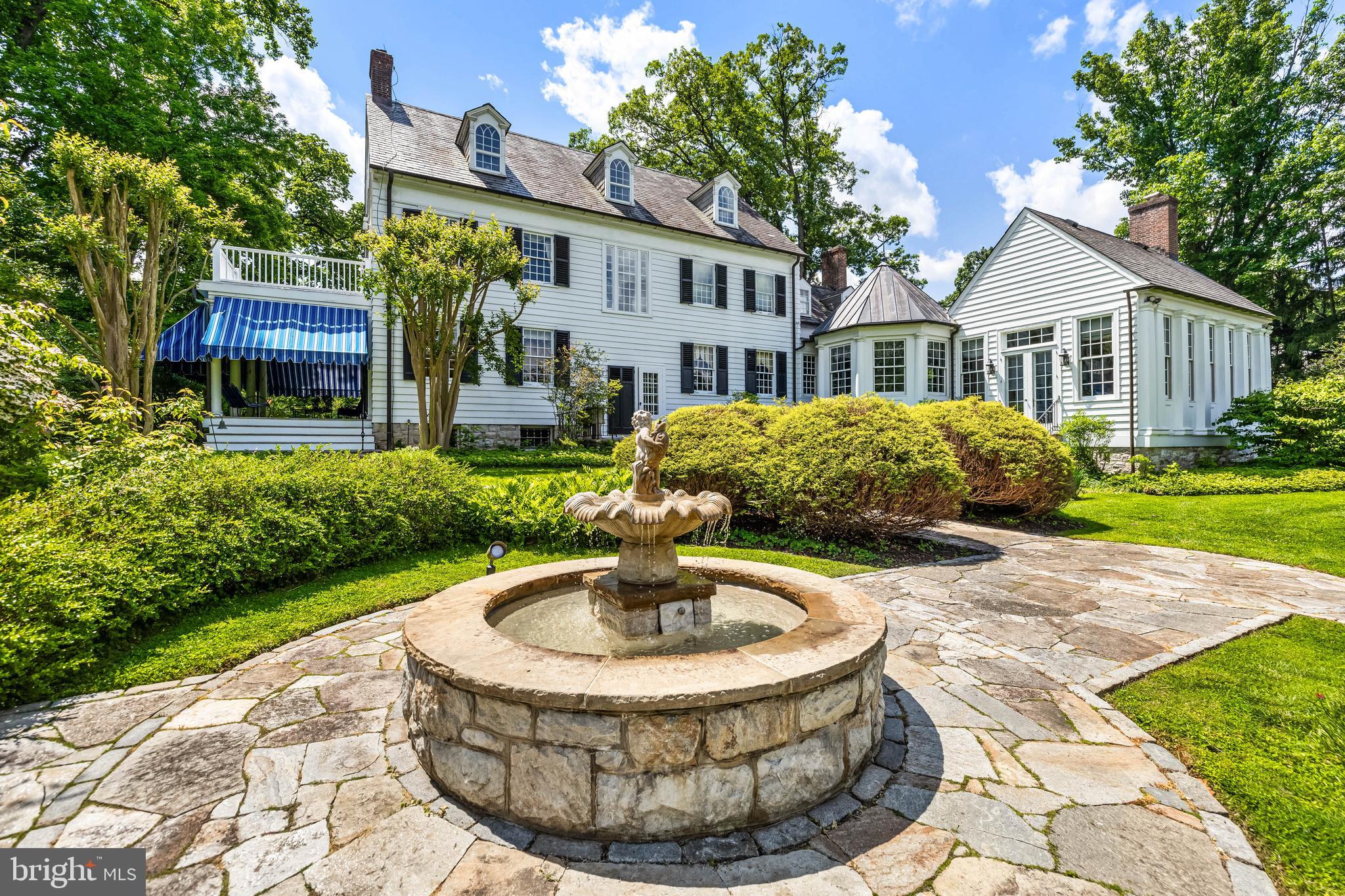 508 Hampton Lane Baltimore, MD 21286 - Photo 68 of 74 a front view of a house with a garden