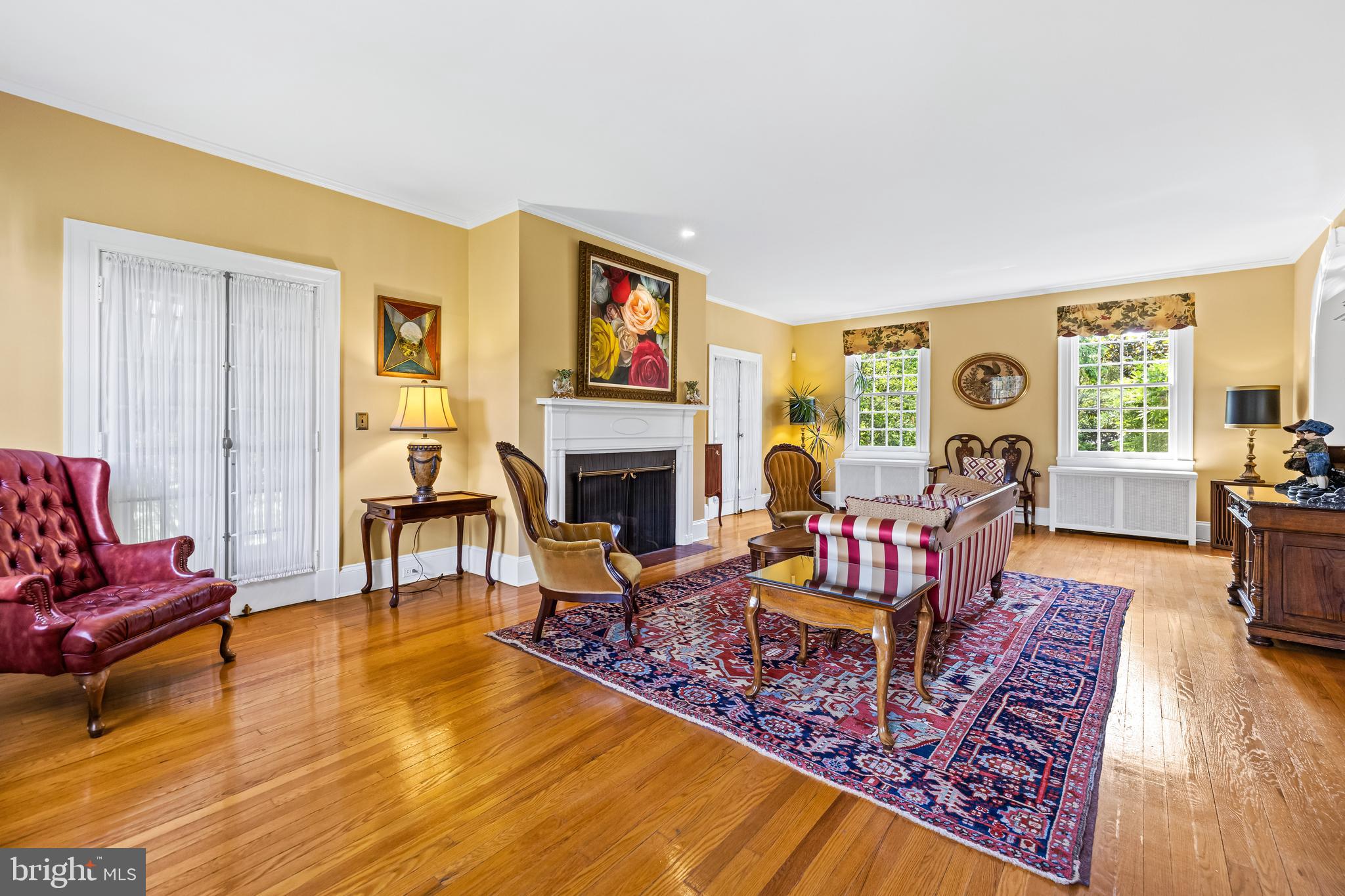 508 Hampton Lane Baltimore, MD 21286 - Photo 7 of 74 a living room with furniture or couch and a fireplace