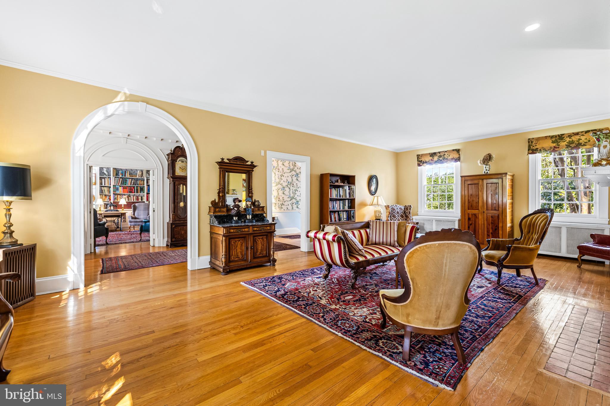 508 Hampton Lane Baltimore, MD 21286 - Photo 9 of 74 a living room with furniture a wooden floor and next to a window
