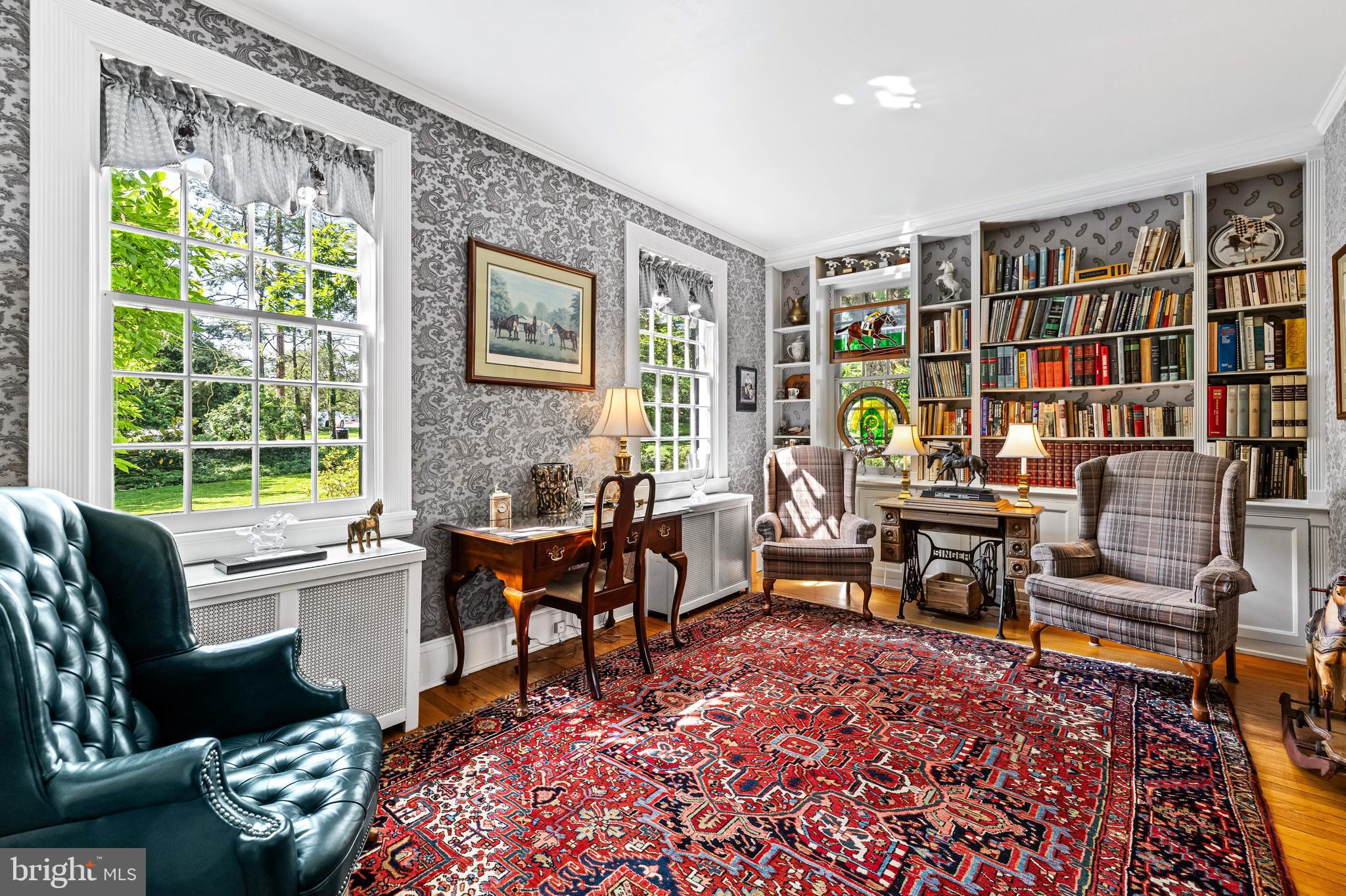 508 Hampton Lane Baltimore, MD 21286 - Photo 10 of 74 a living room with furniture a bookshelf and a window