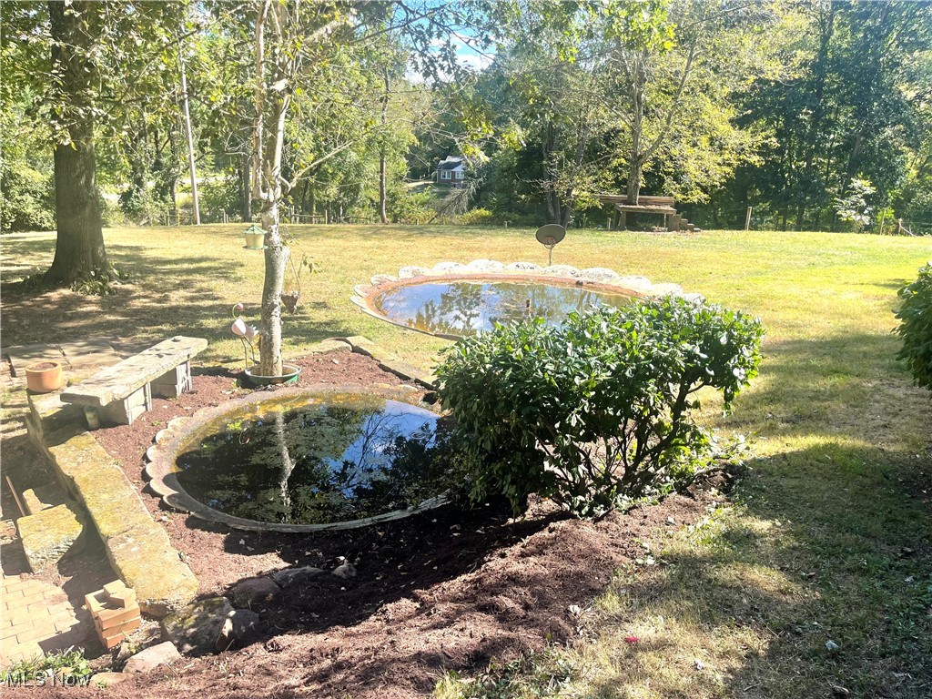 6518 Stonecreek Road Southwest Newcomerstown, OH 43832 - Photo 26 of 42 View of the pond