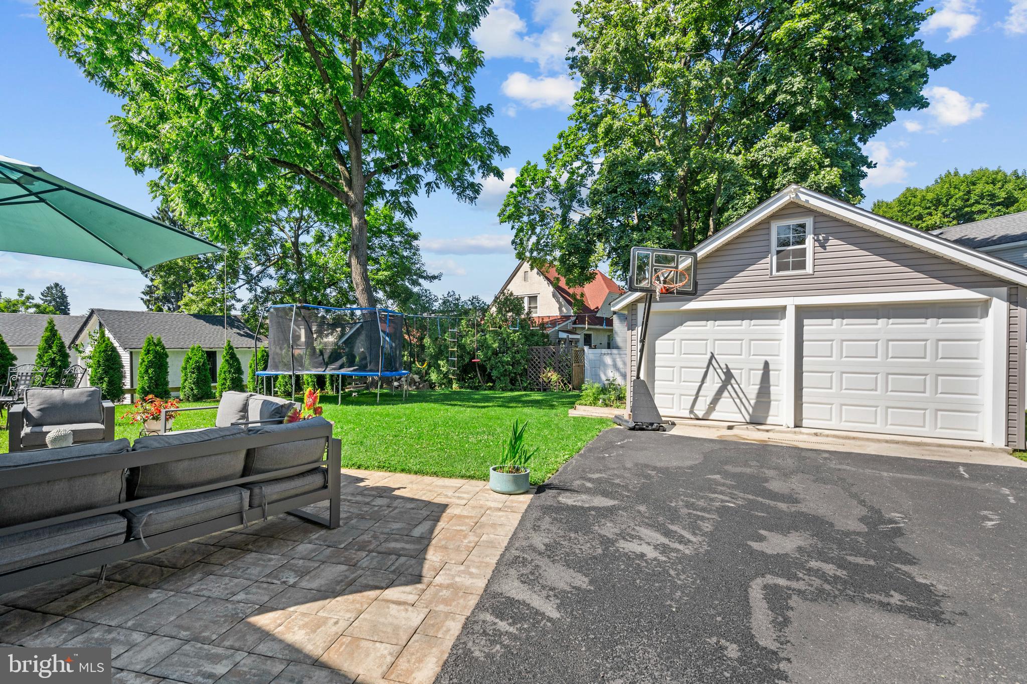 1118 Allston Road Havertown, PA 19083 - Photo 5 of 58 a front view of a house with a garden
