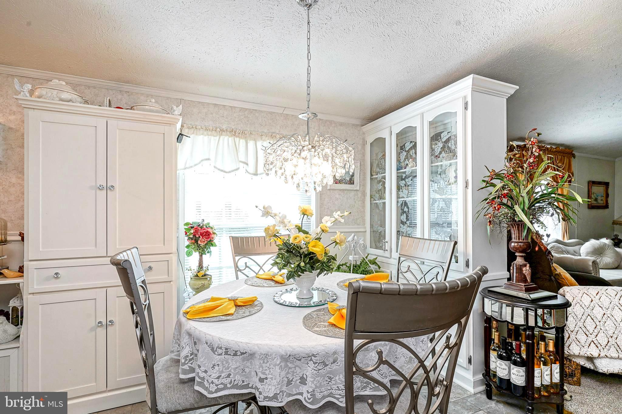 3 Dogwood East Tabernacle, NJ 08088 - Photo 15 of 25 a view of a dining room with furniture window and outside view