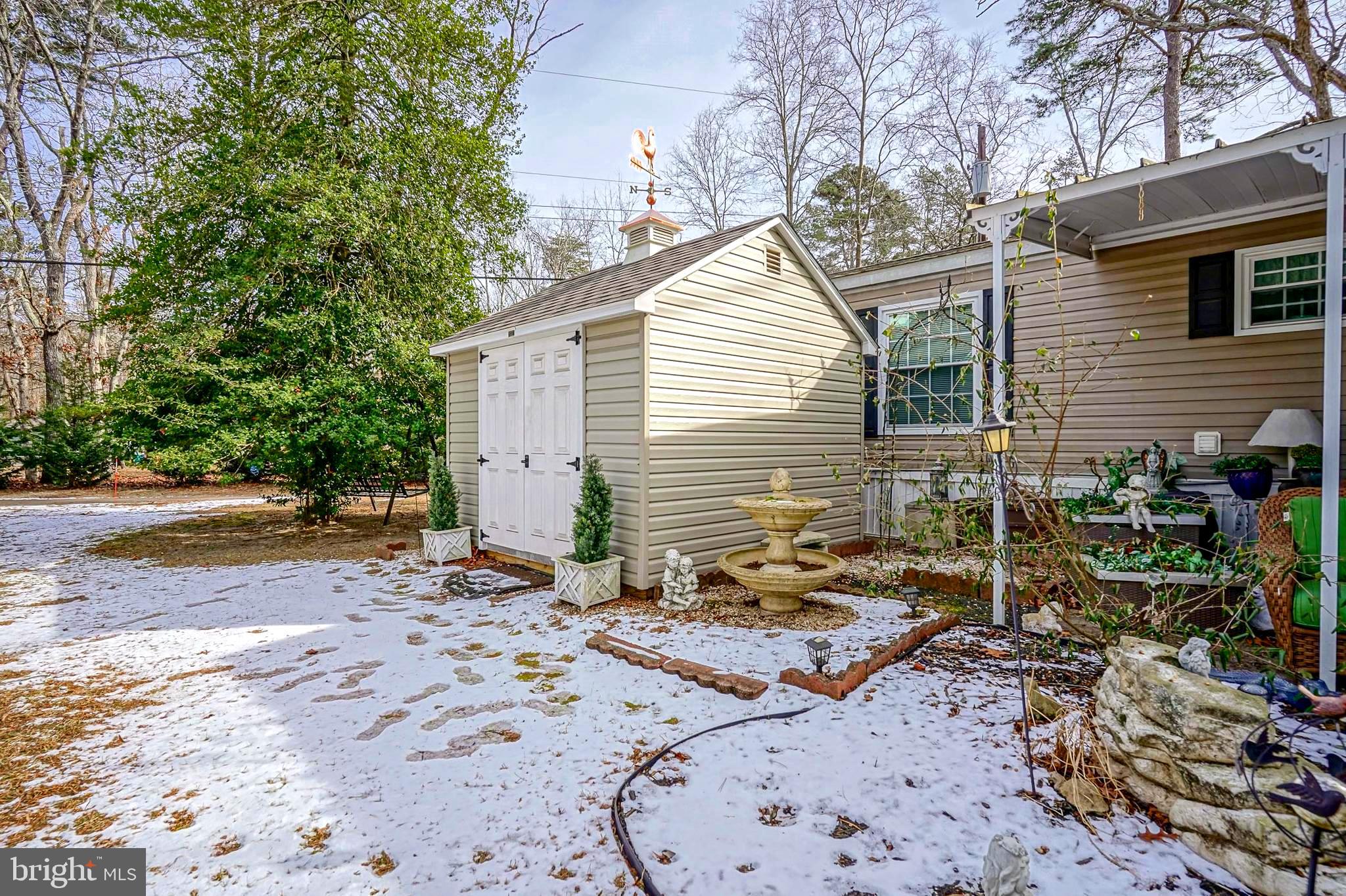 3 Dogwood East Tabernacle, NJ 08088 - Photo 22 of 25 a view of a backyard with chairs