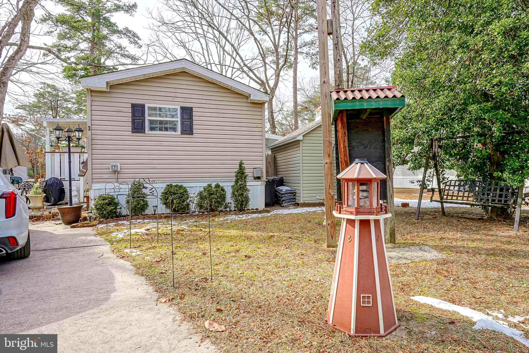 3 Dogwood East Tabernacle, NJ 08088 - Photo 25 of 25 a front view of a house with a yard and trees