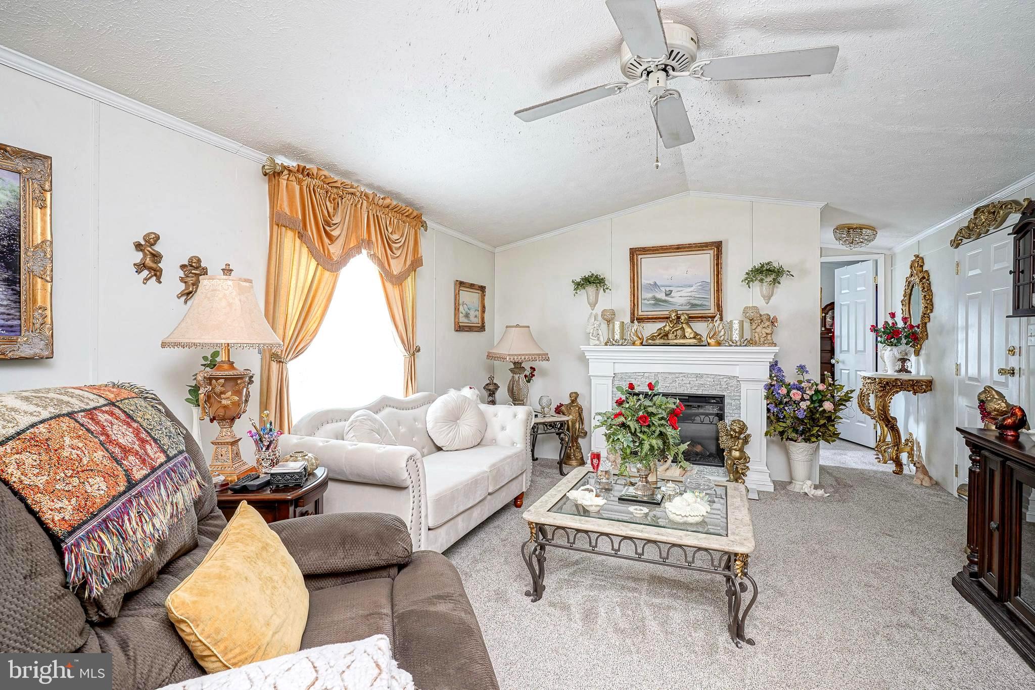 3 Dogwood East Tabernacle, NJ 08088 - Photo 6 of 25 a living room with furniture and a large window