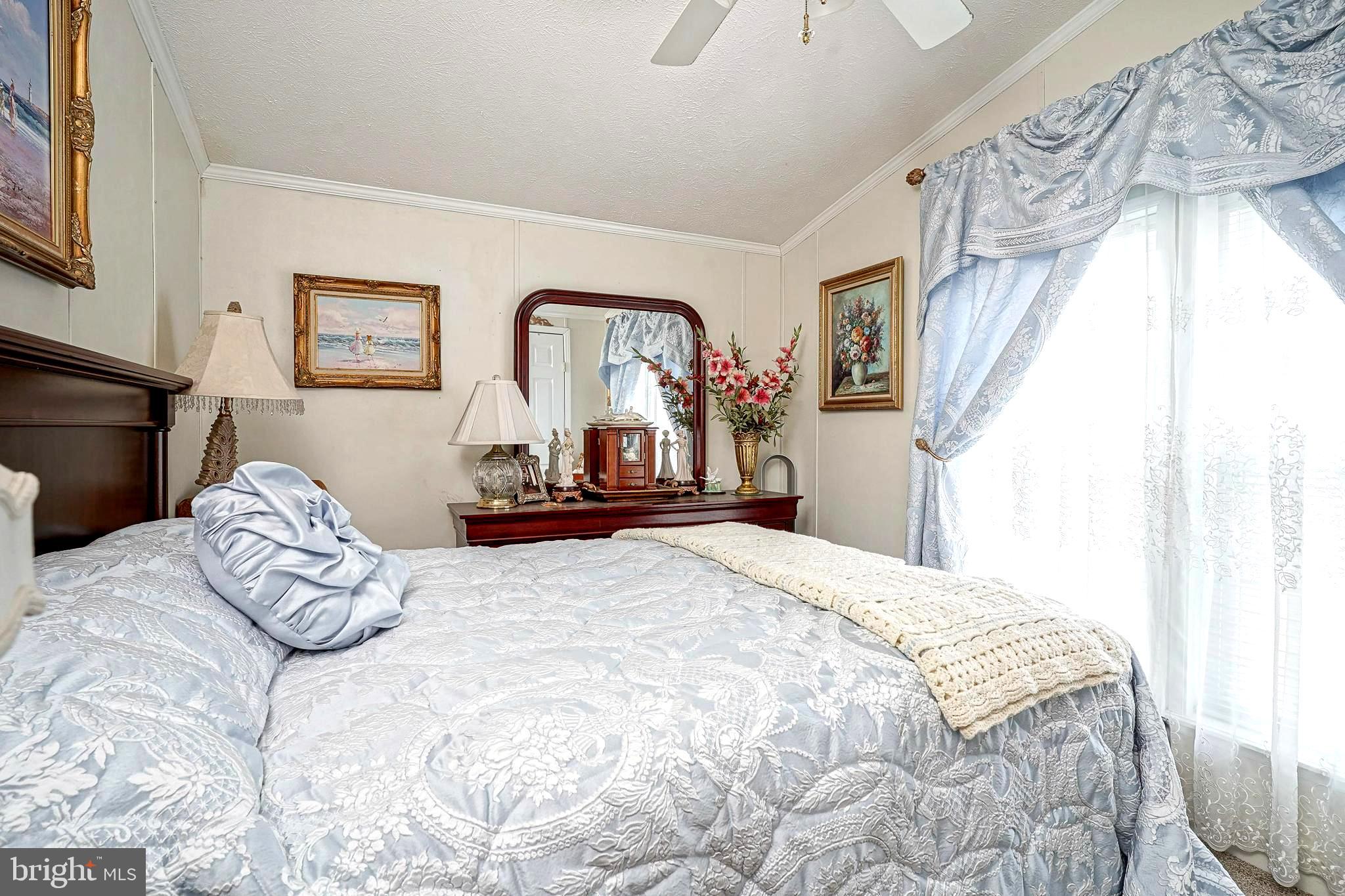 3 Dogwood East Tabernacle, NJ 08088 - Photo 9 of 25 a bedroom with a bed and a large mirror on the dresser
