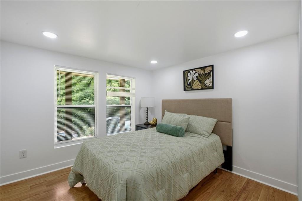 965 Houston Mill Road Northeast Atlanta, GA 30329 - Photo 27 of 42 a bedroom with a large bed and a window