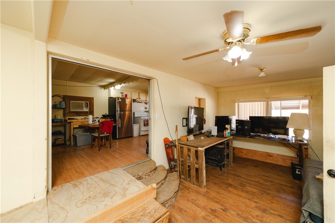 9769 North Rose Quartz Road Chloride, AZ 86431 - Photo 35 of 91 a view of a workspace with furniture and a livingroom