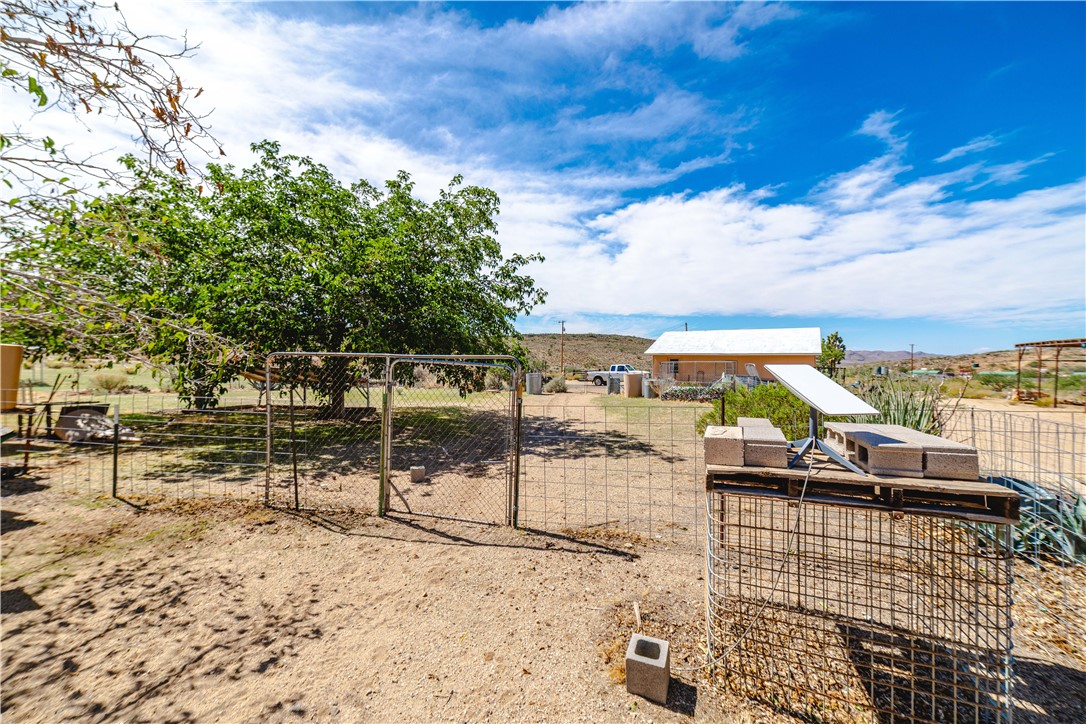 9769 North Rose Quartz Road Chloride, AZ 86431 - Photo 48 of 91 a view of a terrace with chairs