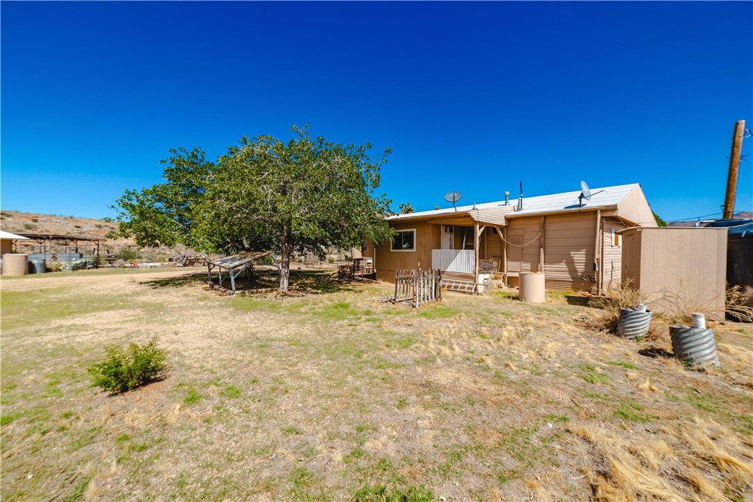9769 North Rose Quartz Road Chloride, AZ 86431 - Photo 56 of 91 a view of a house with backyard