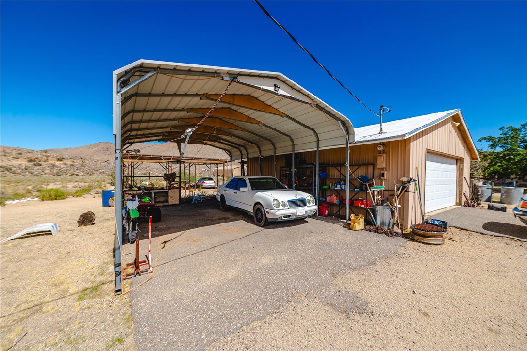 9769 North Rose Quartz Road Chloride, AZ 86431 - Photo 69 of 91 a view of parking garage with cars
