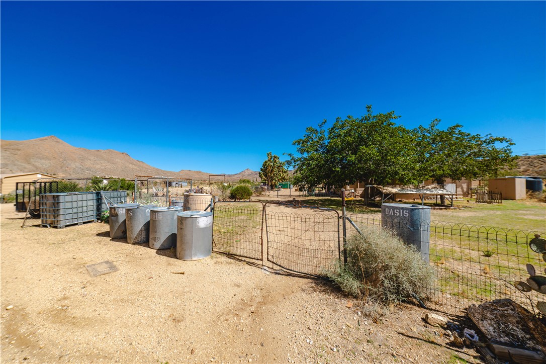 9769 North Rose Quartz Road Chloride, AZ 86431 - Photo 71 of 91 a view of a lake with a house in the background