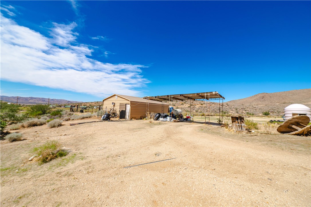 9769 North Rose Quartz Road Chloride, AZ 86431 - Photo 79 of 91 a view of large road with a big yard