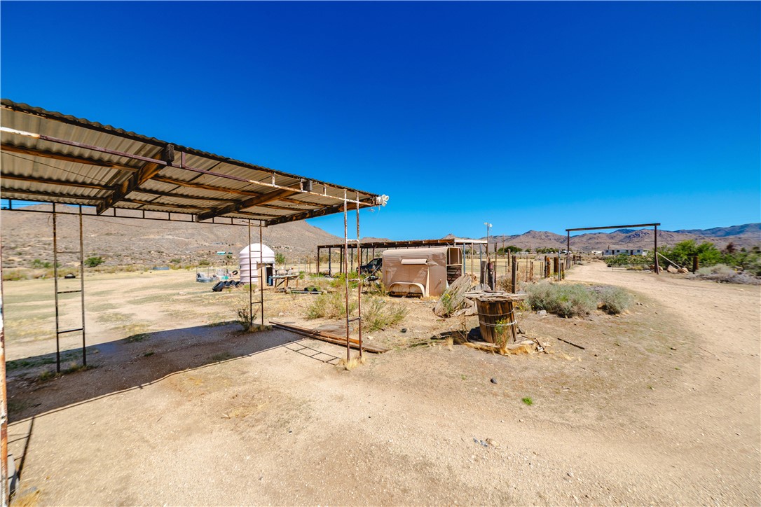9769 North Rose Quartz Road Chloride, AZ 86431 - Photo 81 of 91 a view of a backyard of a house