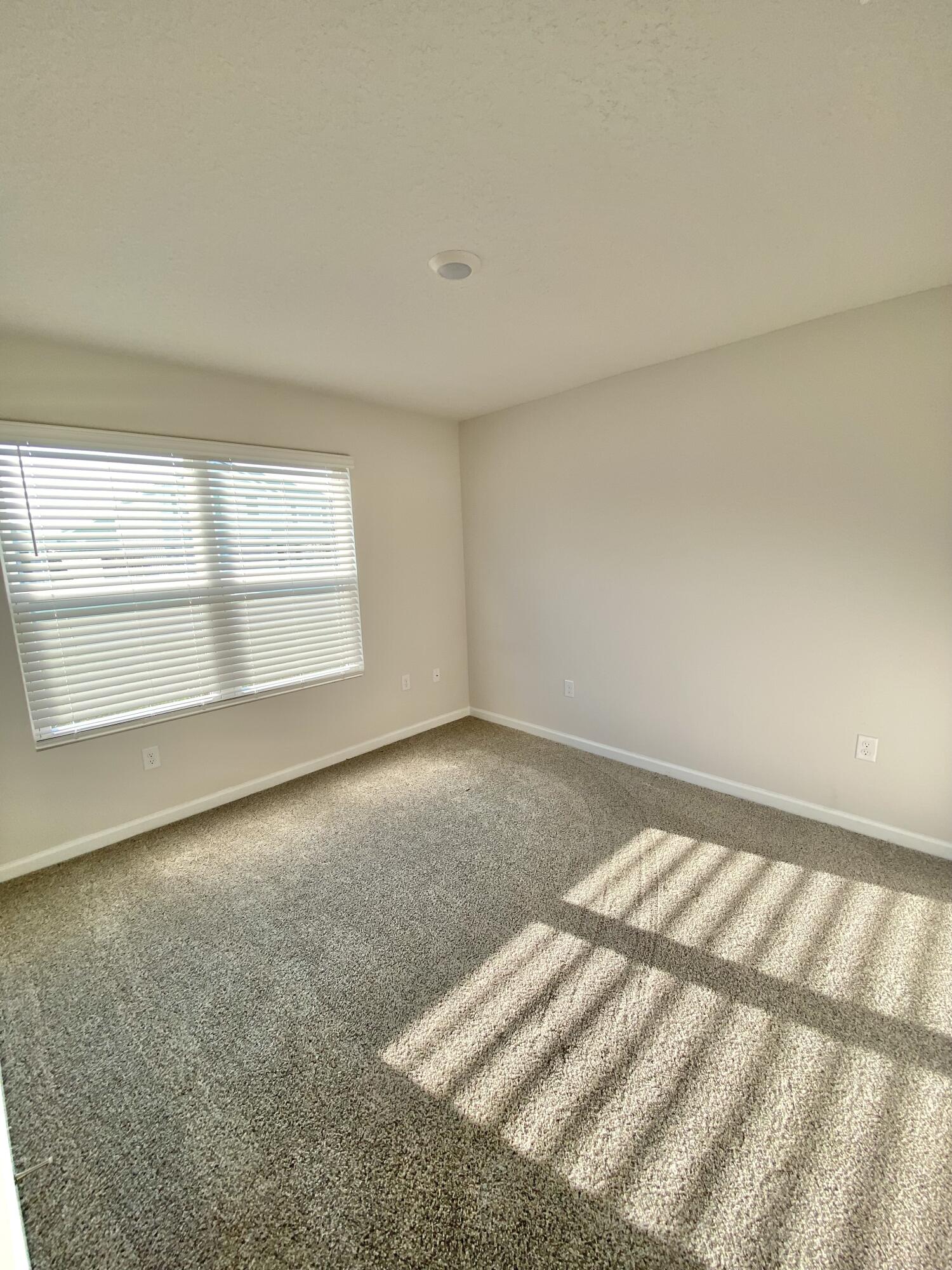 337 Flounder Street Crestview, FL 32539 - Photo 13 of 53 a view of an empty room and a window