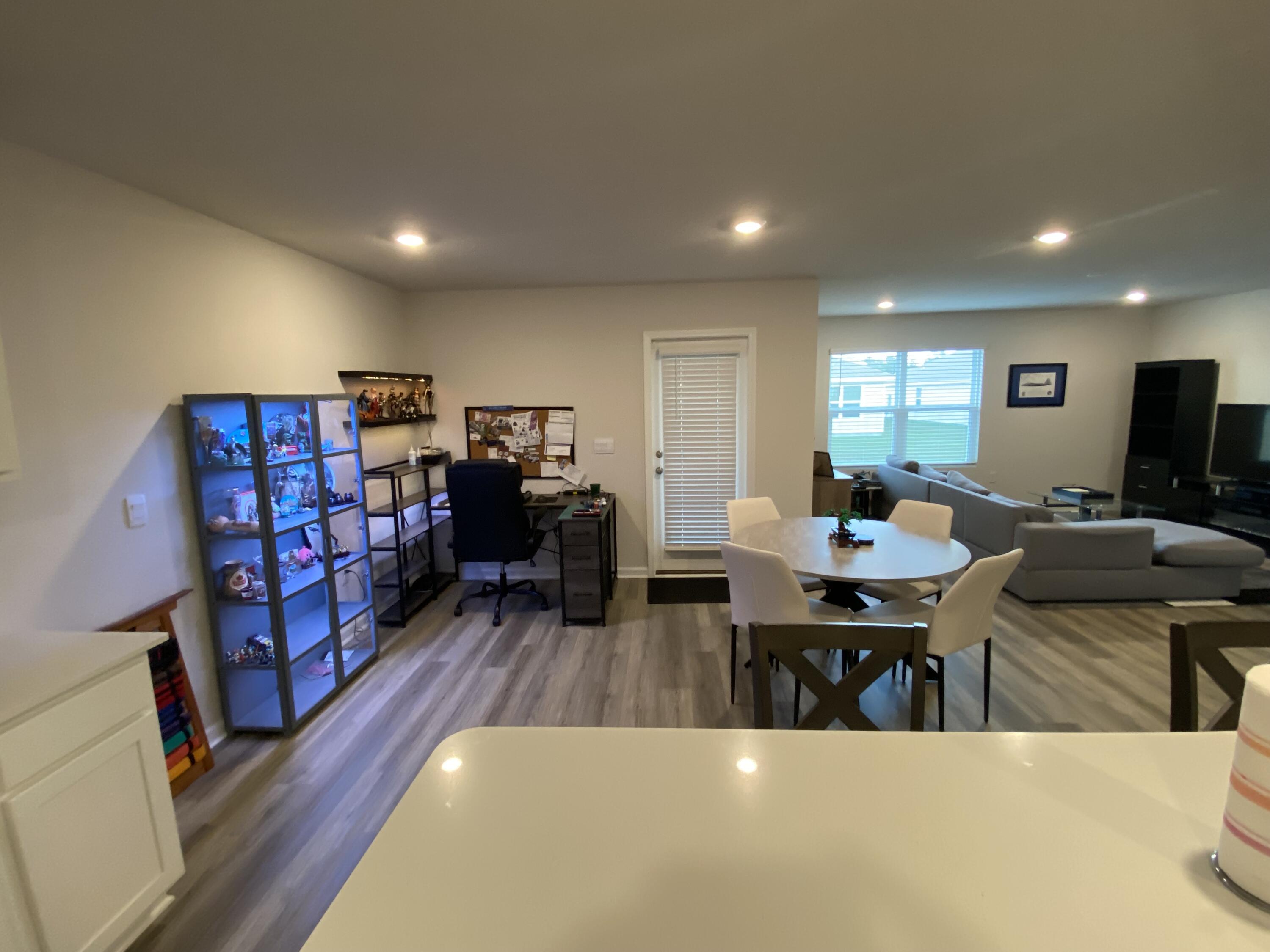 337 Flounder Street Crestview, FL 32539 - Photo 24 of 46 a living room with lots of furniture and wooden floors
