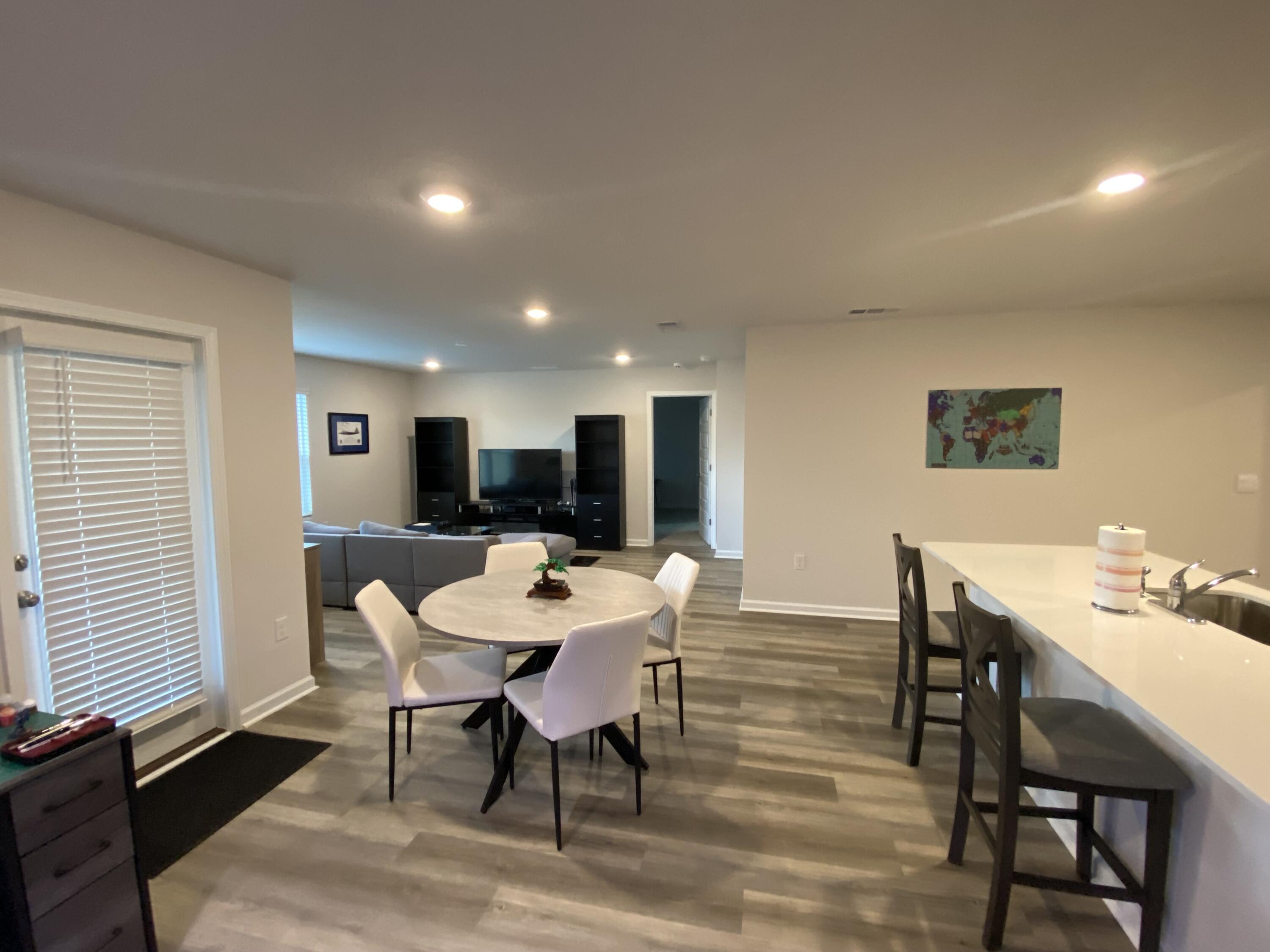 337 Flounder Street Crestview, FL 32539 - Photo 26 of 46 a view of a dining room with furniture