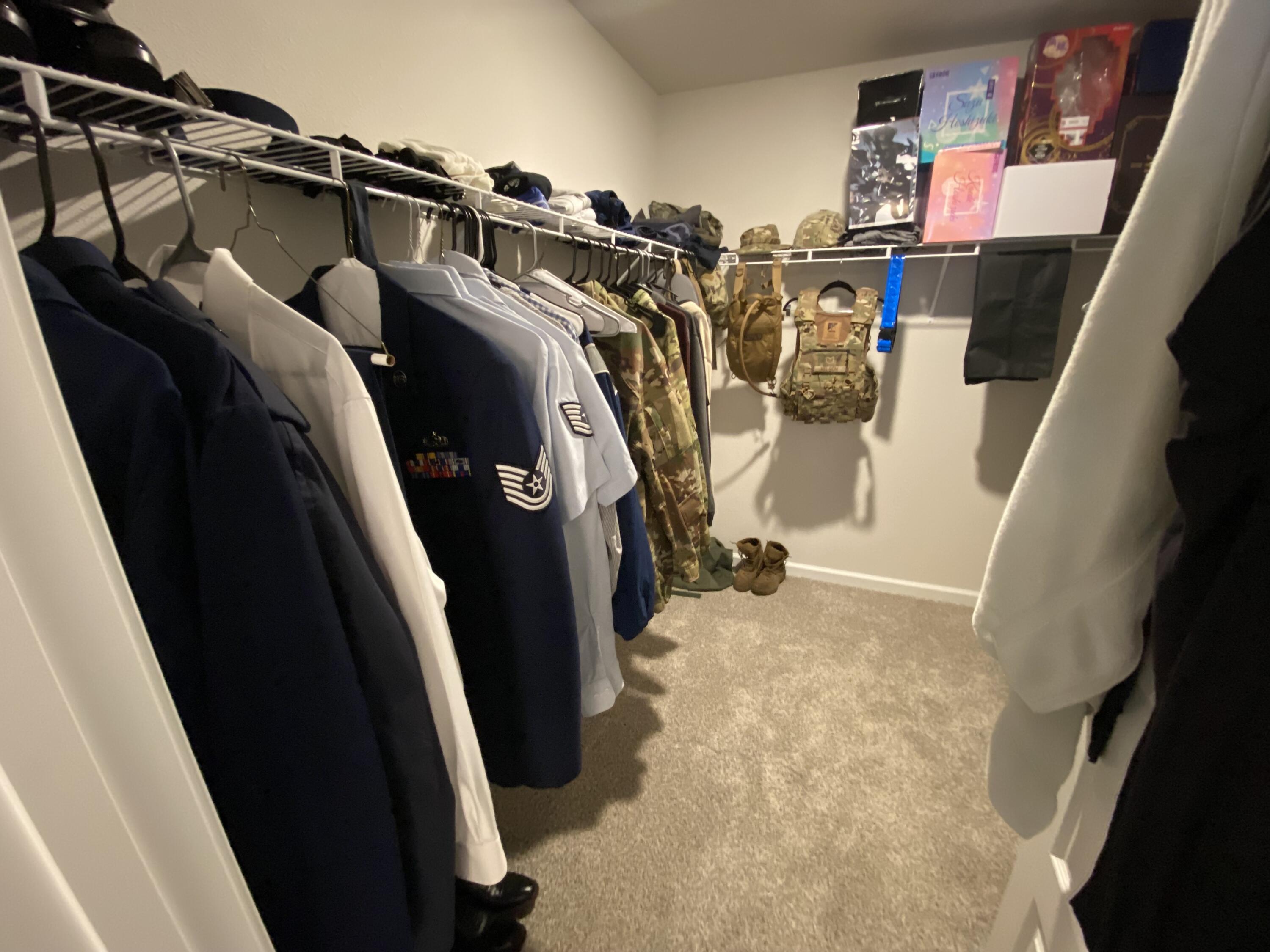 337 Flounder Street Crestview, FL 32539 - Photo 34 of 46 a view of walk in closet with clothes